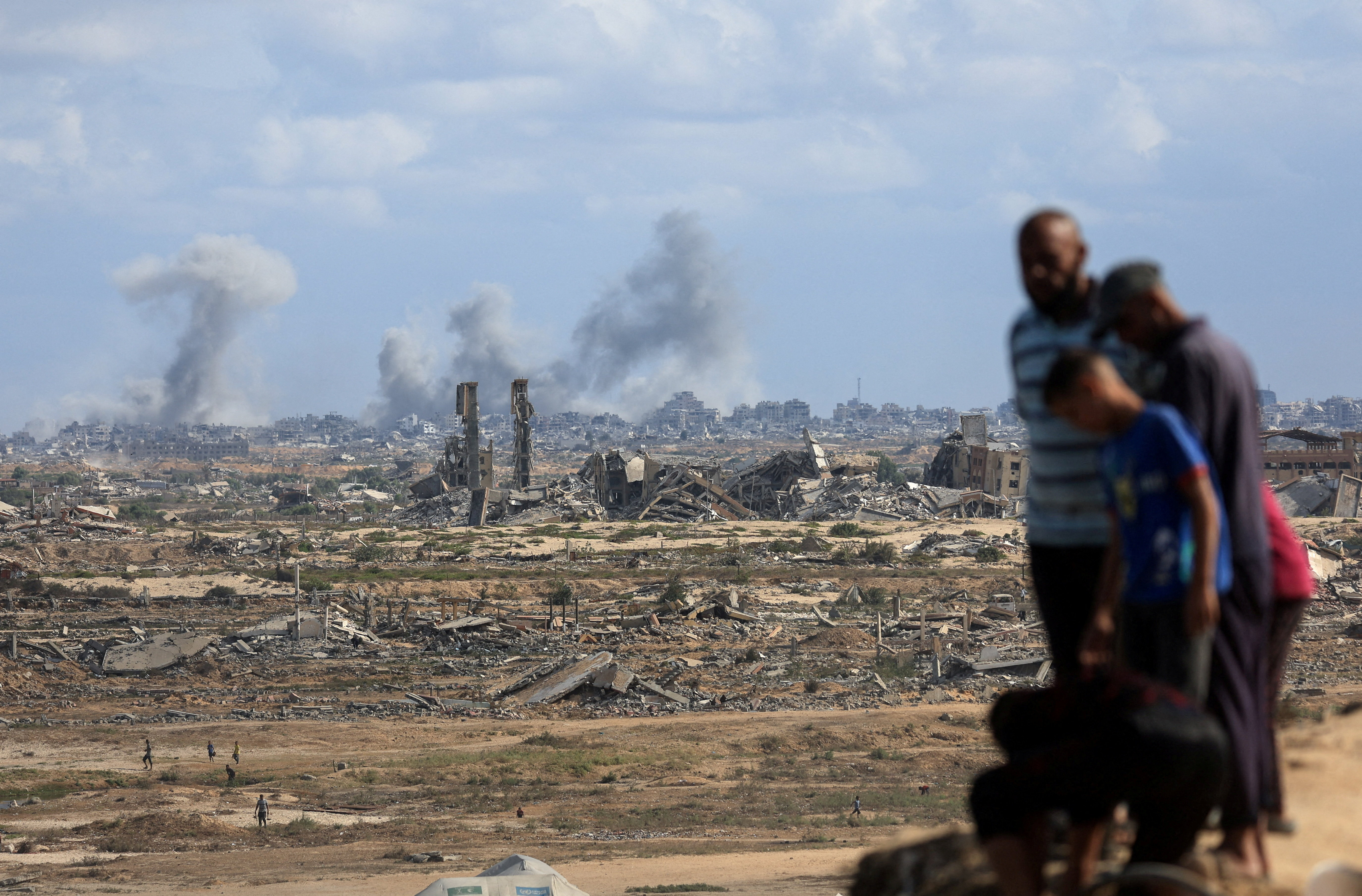 Smoke rises following explosions during the Israeli military offensive in Gaza City, as seen from the central Gaza Strip
