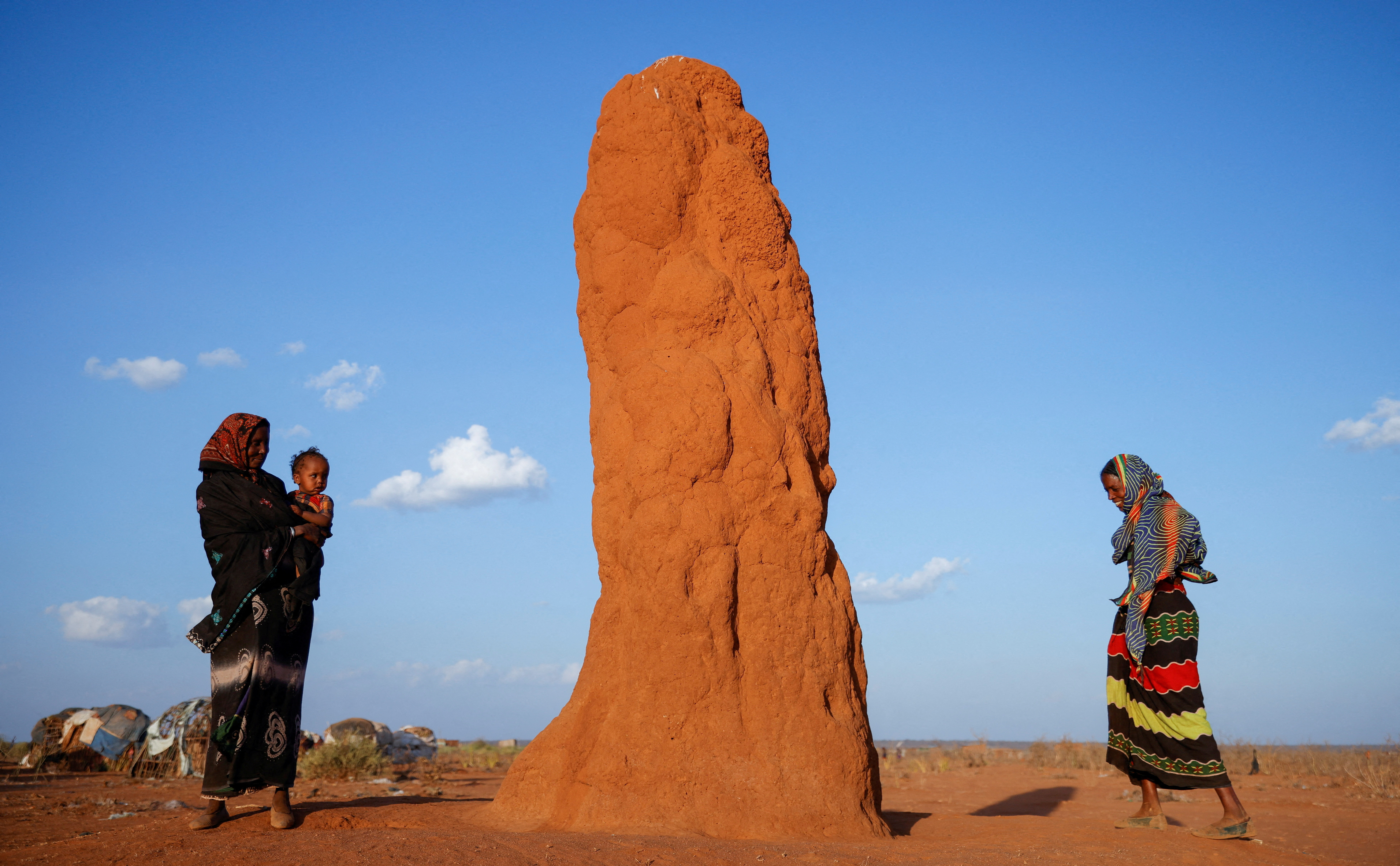 FILE PHOTO: Women walk in Dubluk camp for the people internally displaced by drought in Dubluk town, Oromiya region