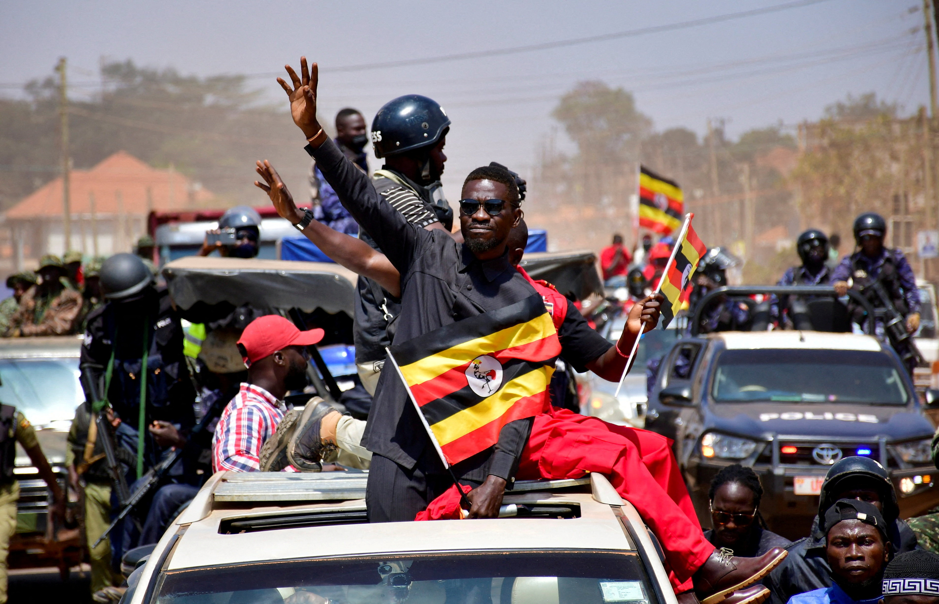FILE PHOTO: Ugandan presidential candidate Robert Kyagulanyi of the National Unity Platform (NUP) party attends a campaign rally, in Kampala