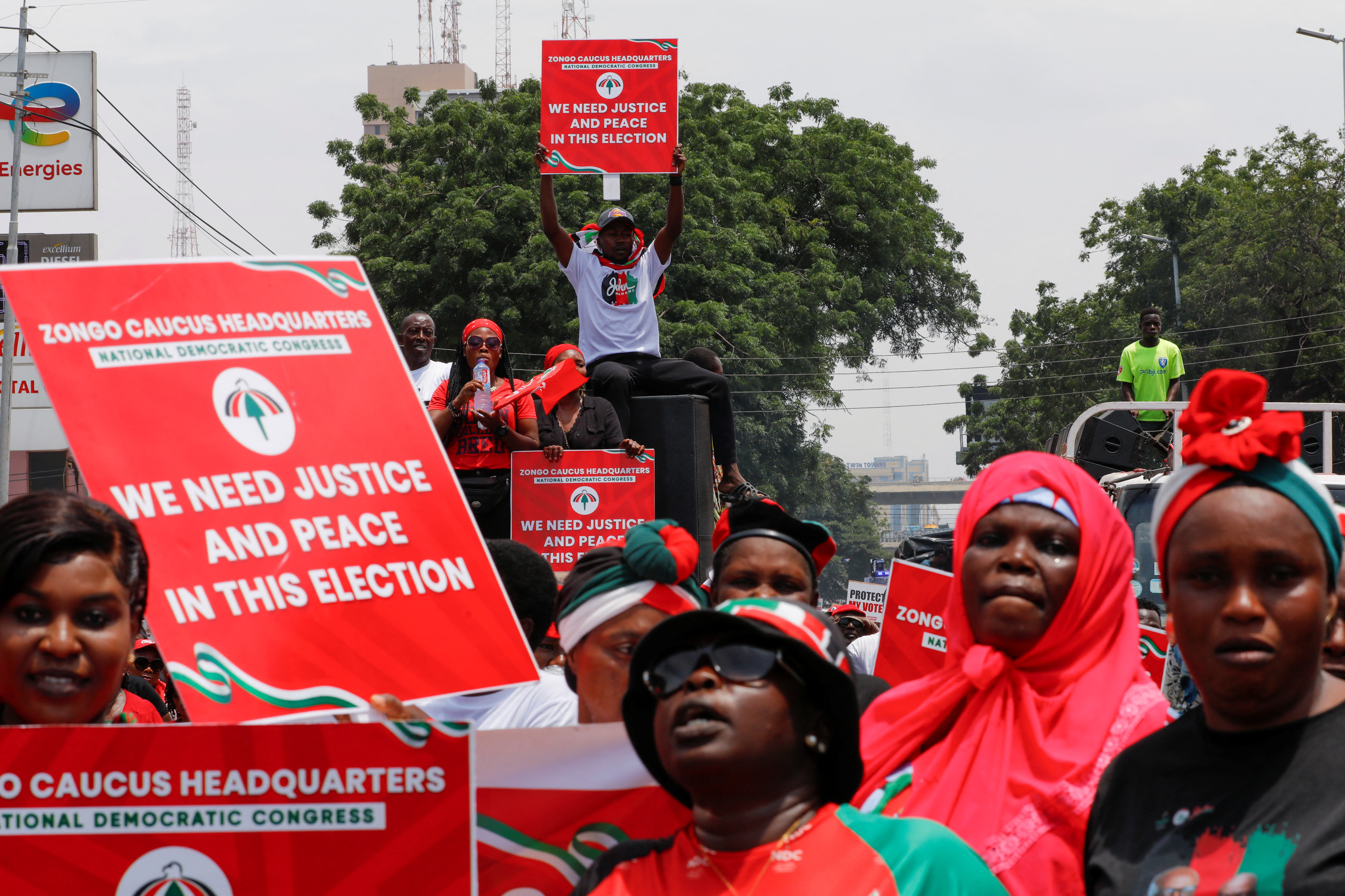 Supporters of Ghana's main NDC party protest what they suspect to be voter roll irregularities, in Accra