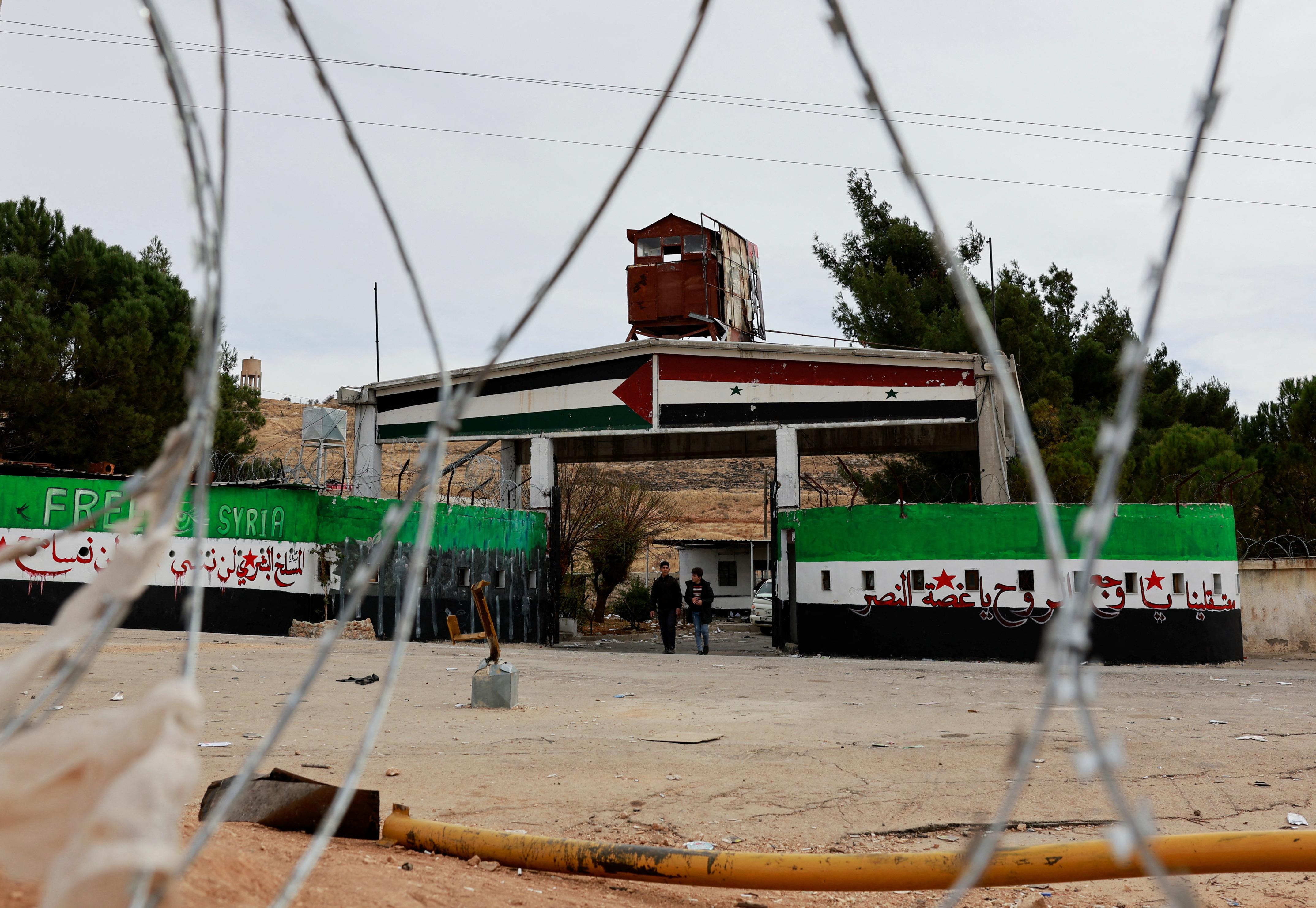 People search for prisoners at Sednaya prison after rebels seized the capital and announced that they have ousted President Bashar al-Assad in Sednaya, Syria