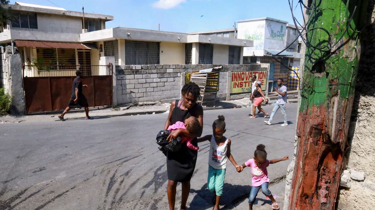 Haitians flee homes due to gang violence, in Port-au-Prince