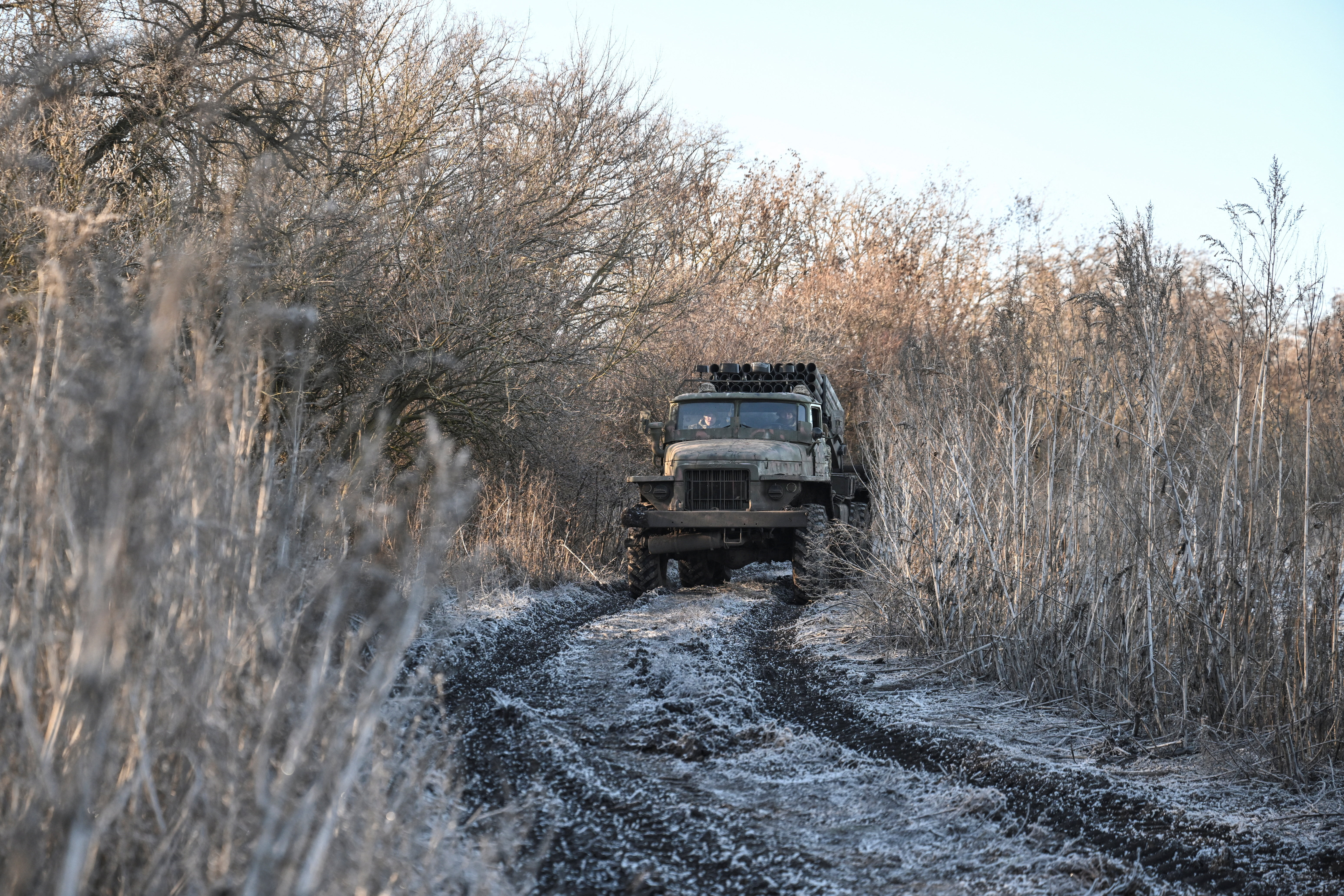 Ukrainian servicemen drive an MLRS in a front line in Donetsk region