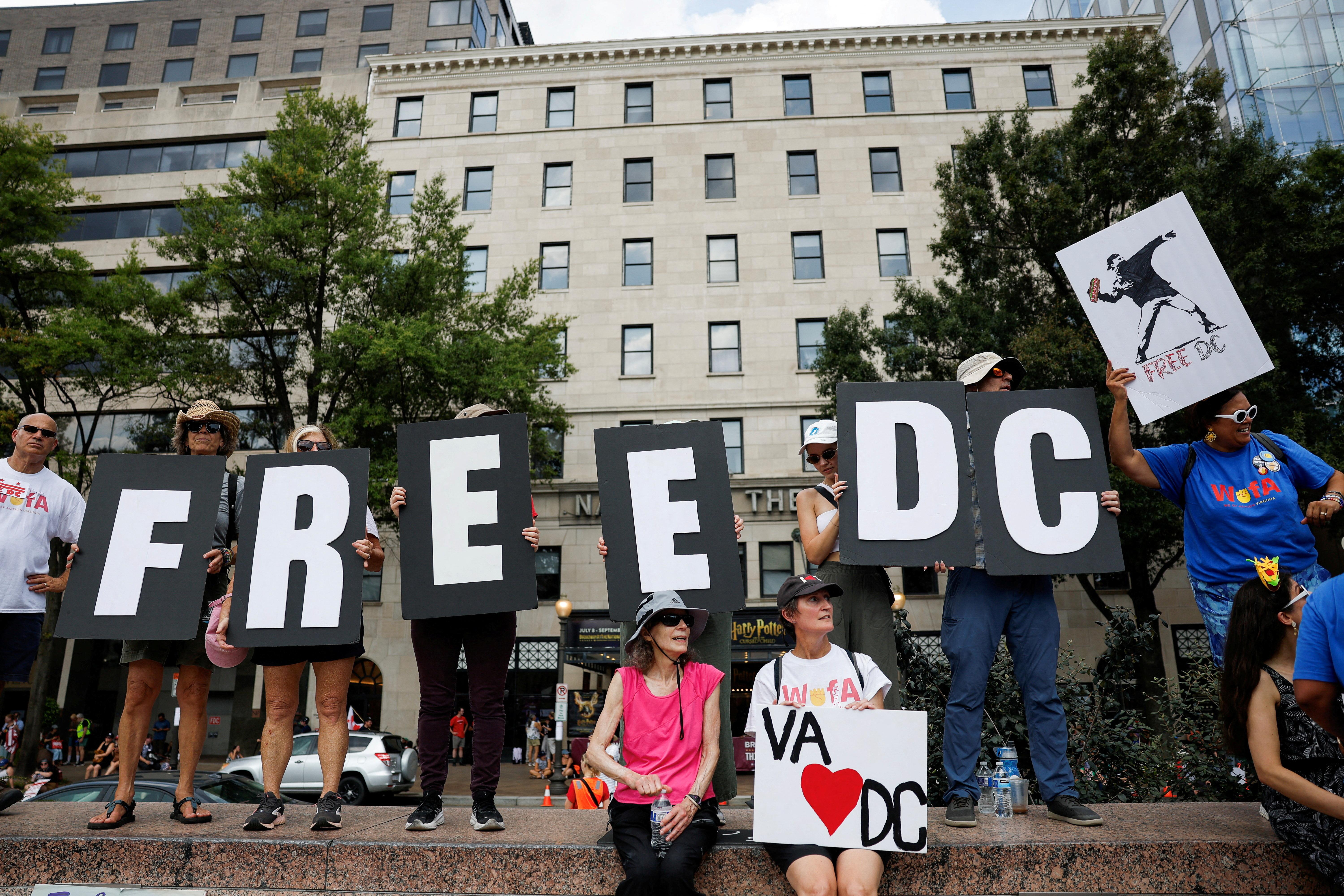 FILE PHOTO: Demonstrators attend "We Are All DC" march, in Washington, D.C.
