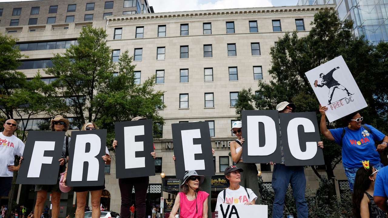 FILE PHOTO: Demonstrators attend "We Are All DC" march, in Washington, D.C.