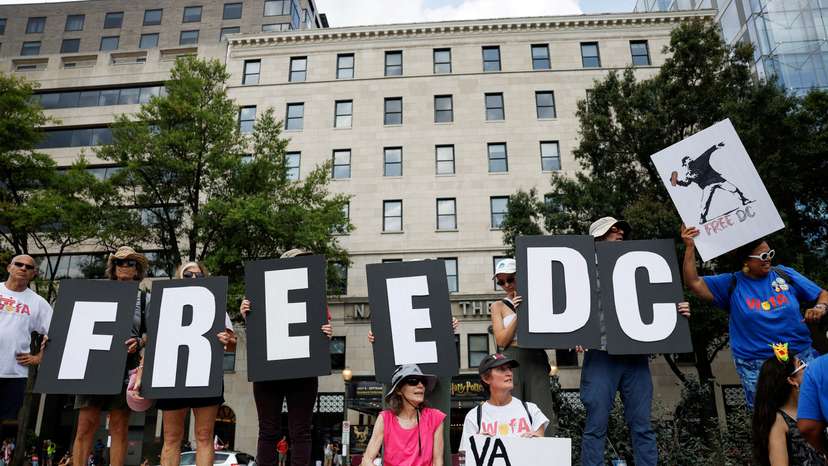FILE PHOTO: Demonstrators attend "We Are All DC" march, in Washington, D.C.