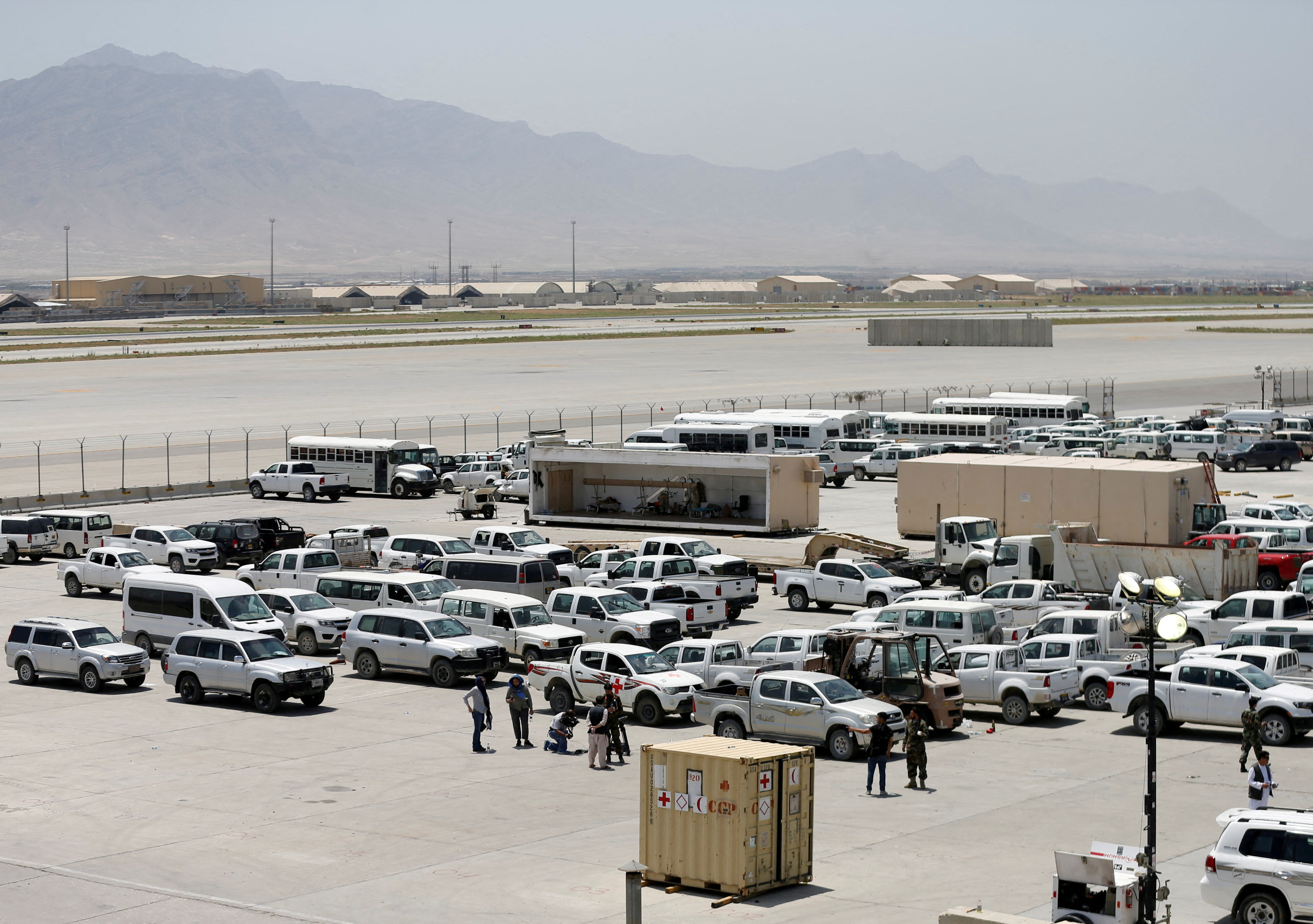 FILE PHOTO: FILE PHOTO: Parked vehicles are seen in Bagram U.S. air base, after American troops vacated it, in Parwan province