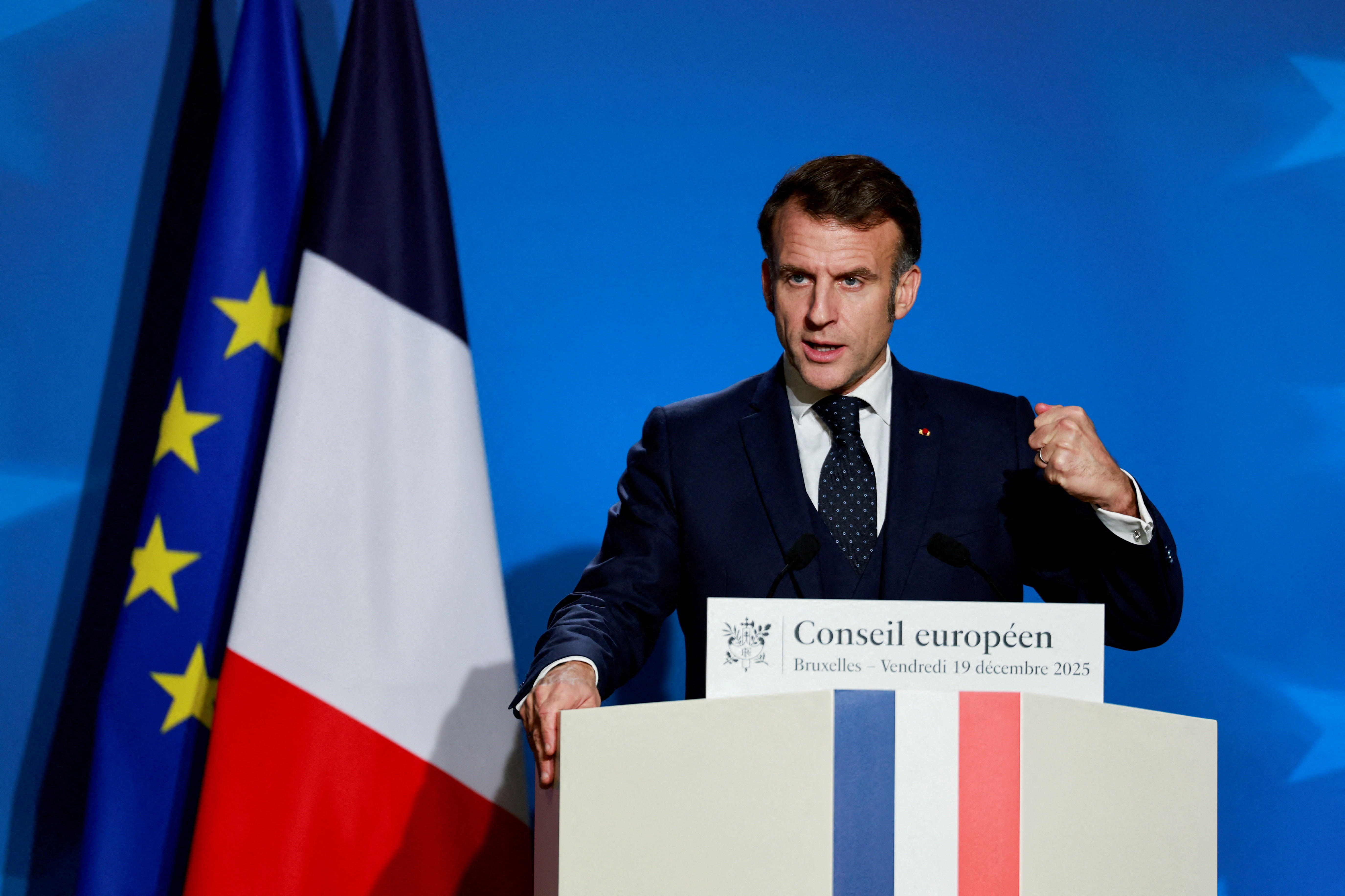 FILE PHOTO: French President Emmanuel Macron holds a press conference during a European Union leaders' summit, in Brussels