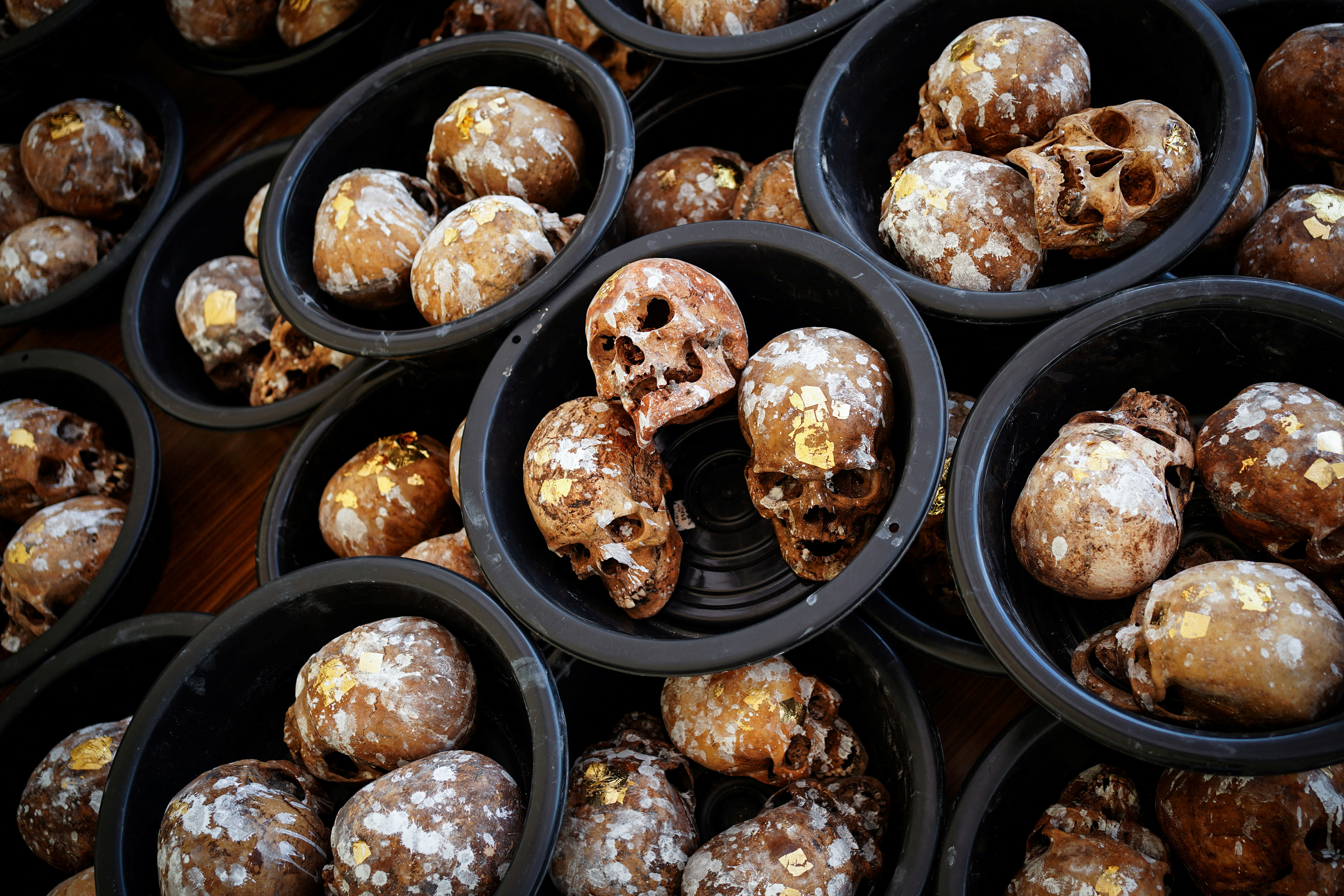 The Wider Image: Thai ceremony for the dead brings good karma and emotional closure