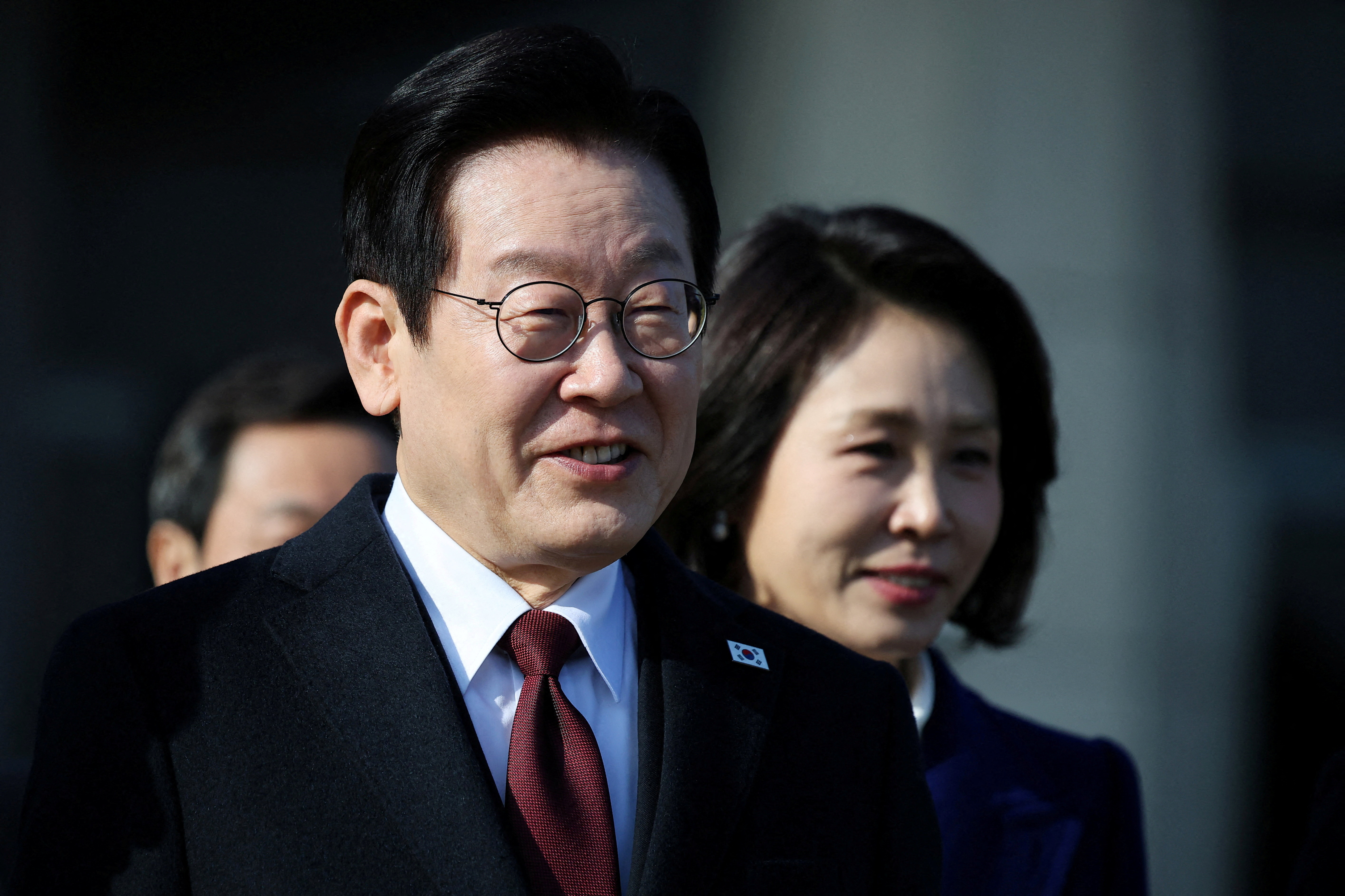 FILE PHOTO: South Korea's President Lee visits China