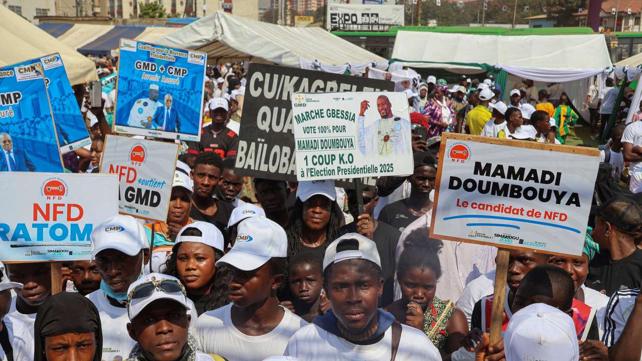 Supporters of Guinean leader and presidential candidate Mamadi Doumbouya attend a campaign rally in Conakry