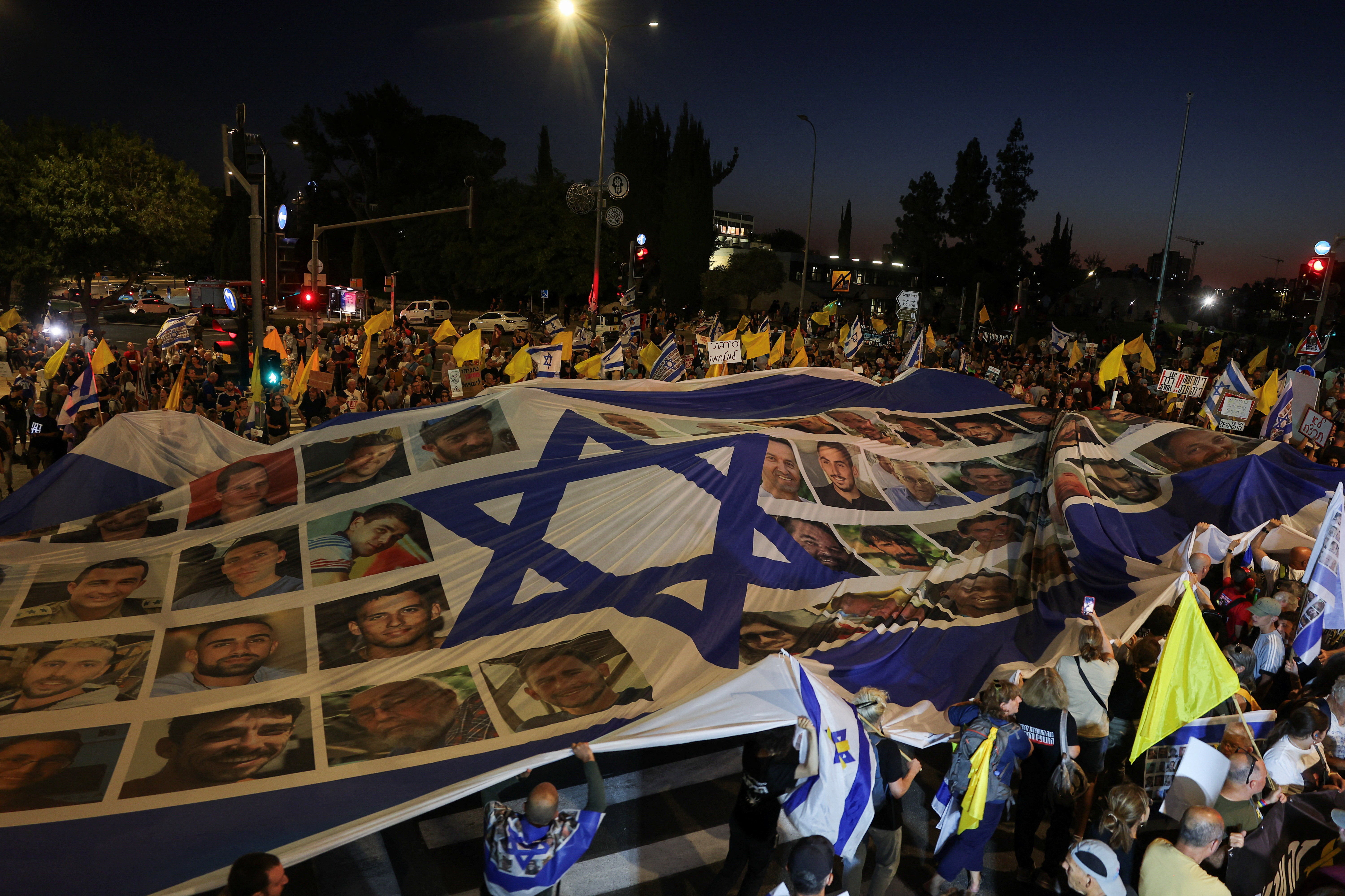 Protest demanding release of hostages held in Gaza outside Israeli PM Netanyahu's office, in Jerusalem