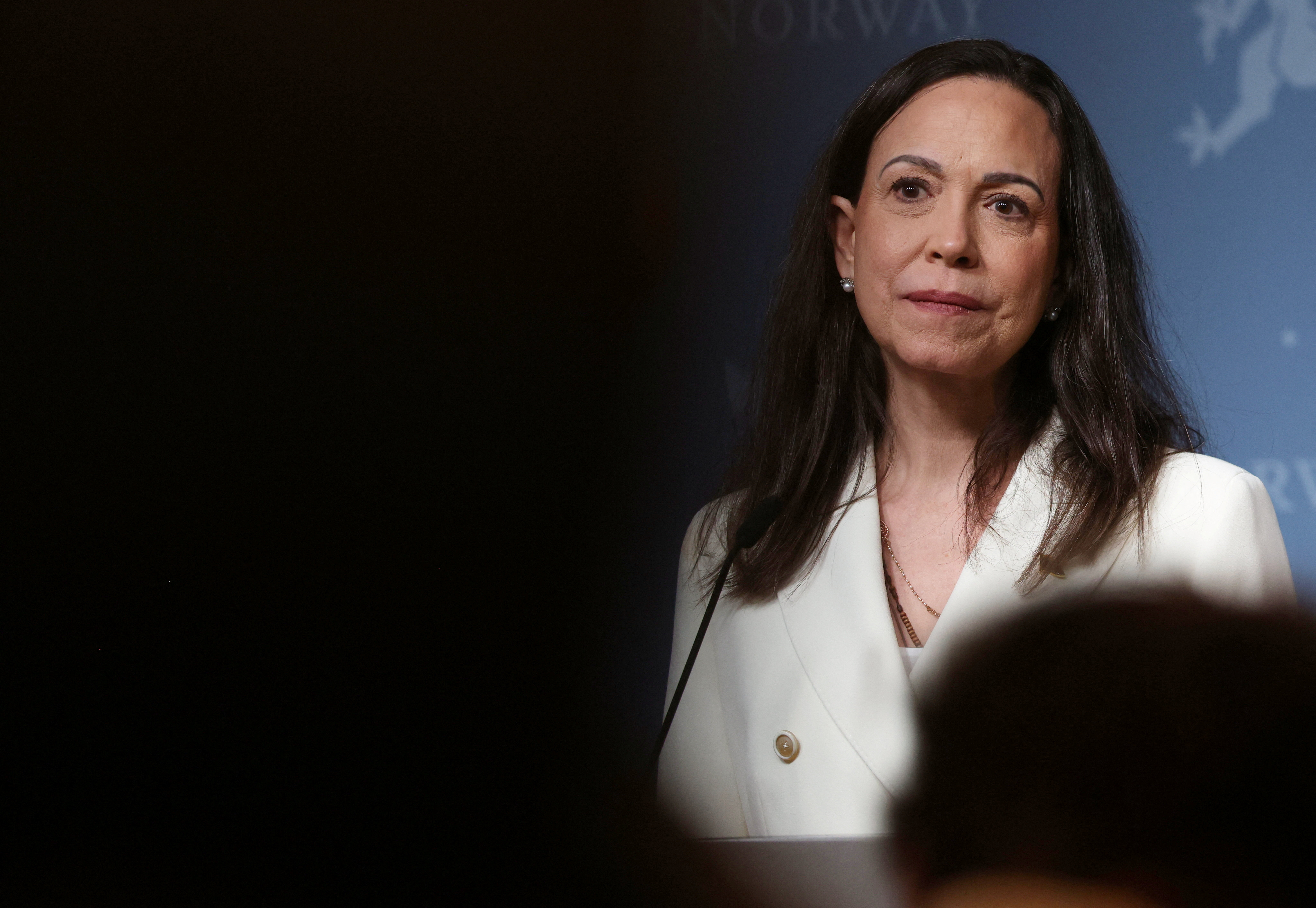 Nobel Peace Prize laureate and Venezuelan opposition leader Maria Corina Machado listens during a press conference in Oslo