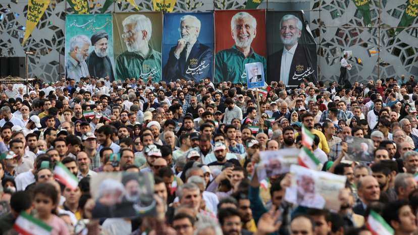 Banners of presidential candidate Saeed Jalili are displayed during a campaign event in Tehran