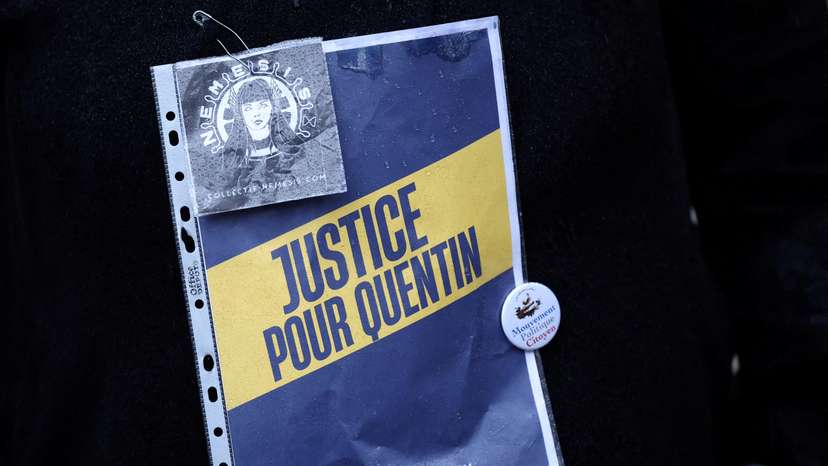 FILE PHOTO: People gather to pay tribute to Quentin, an activist who died from injuries sustained during a beating, during a demonstration in Paris