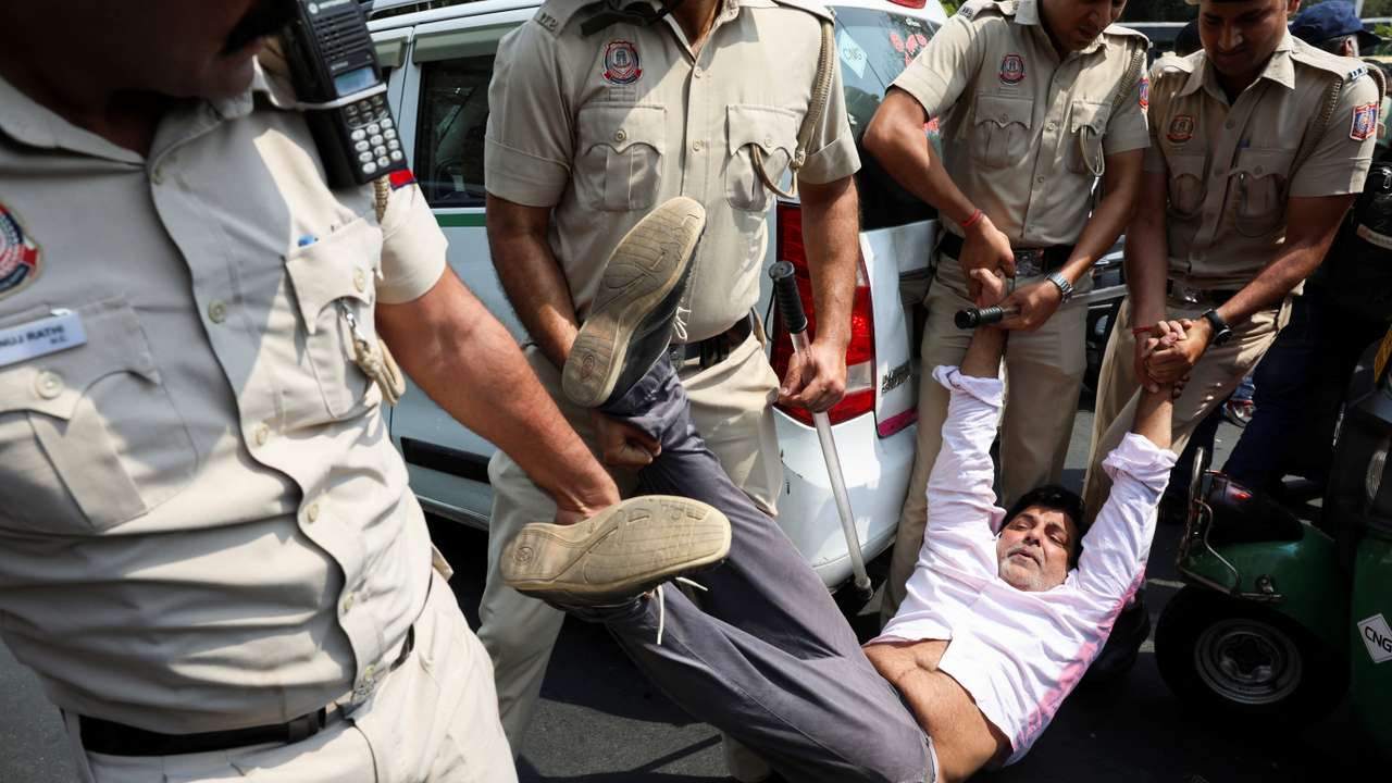 AAP supporters protest after the party's main leader and Delhi CM Arvind Kejriwal's arrest, in New Delhi