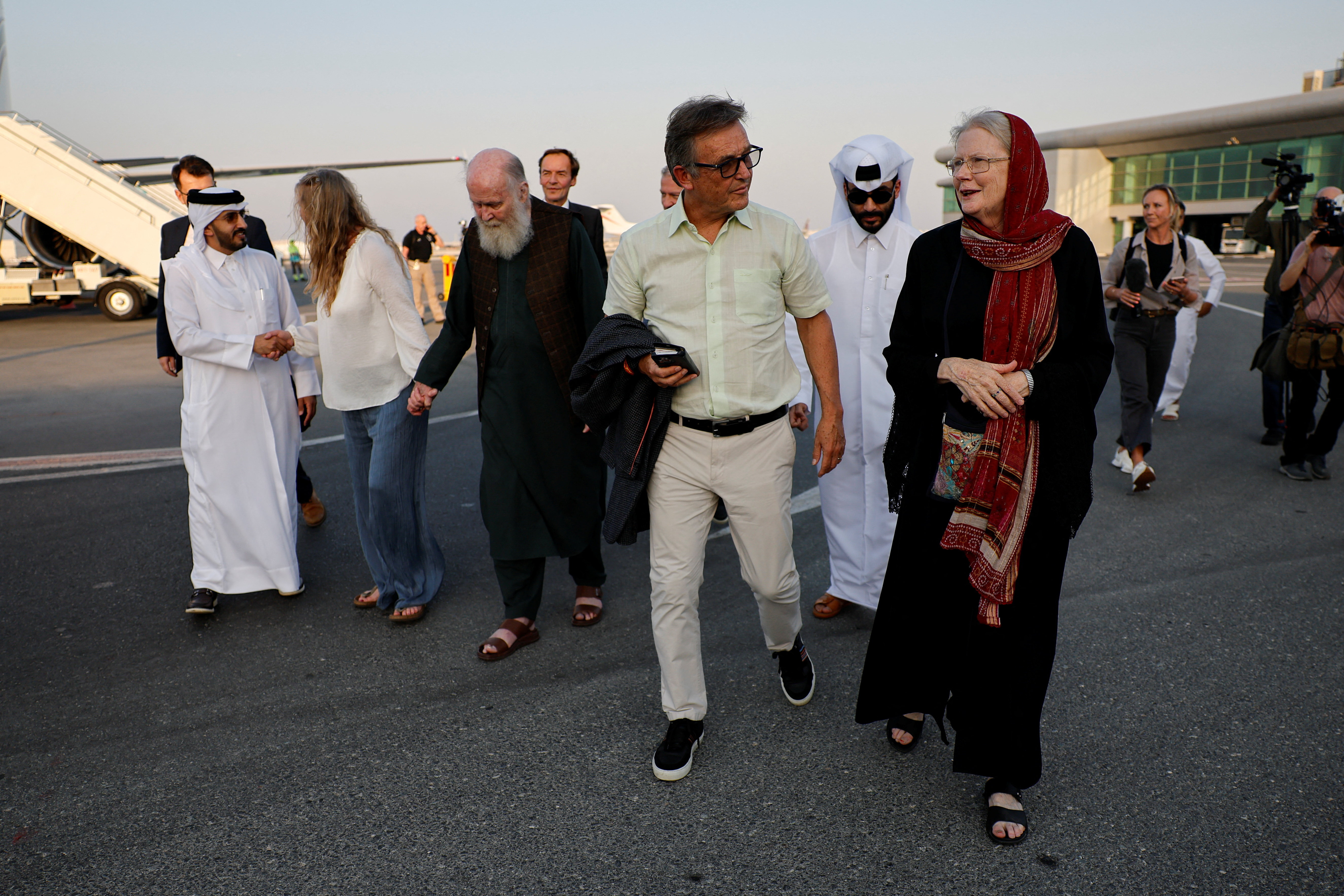 British couple released from detention by Taliban arrive in Doha