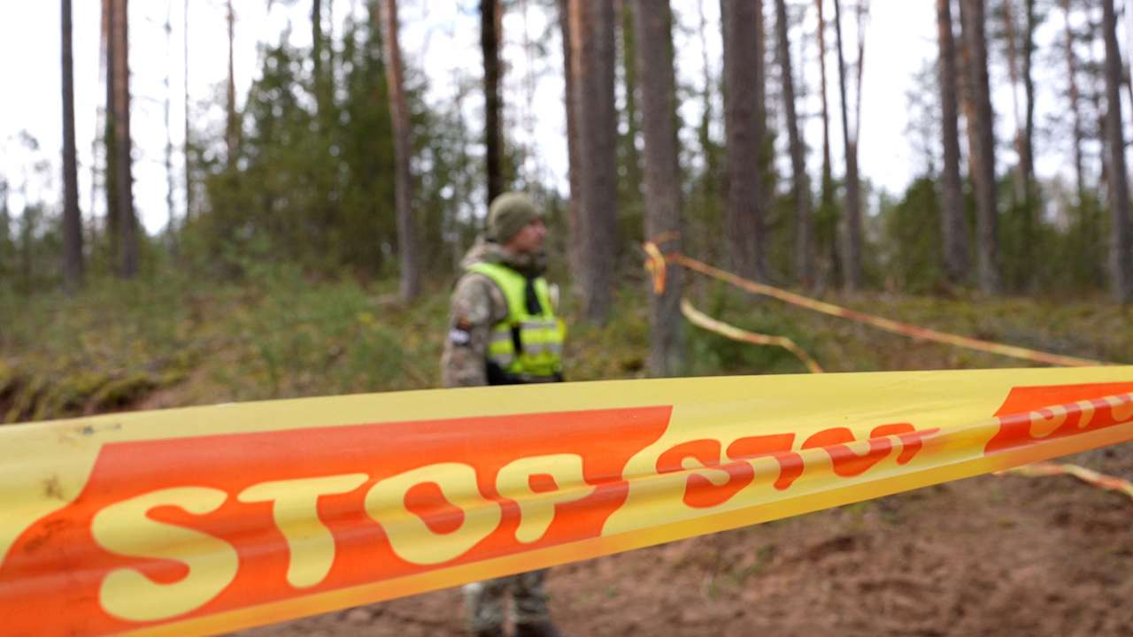 Rescuers dig for missing U.S. soldiers' vehicle in Lithuania