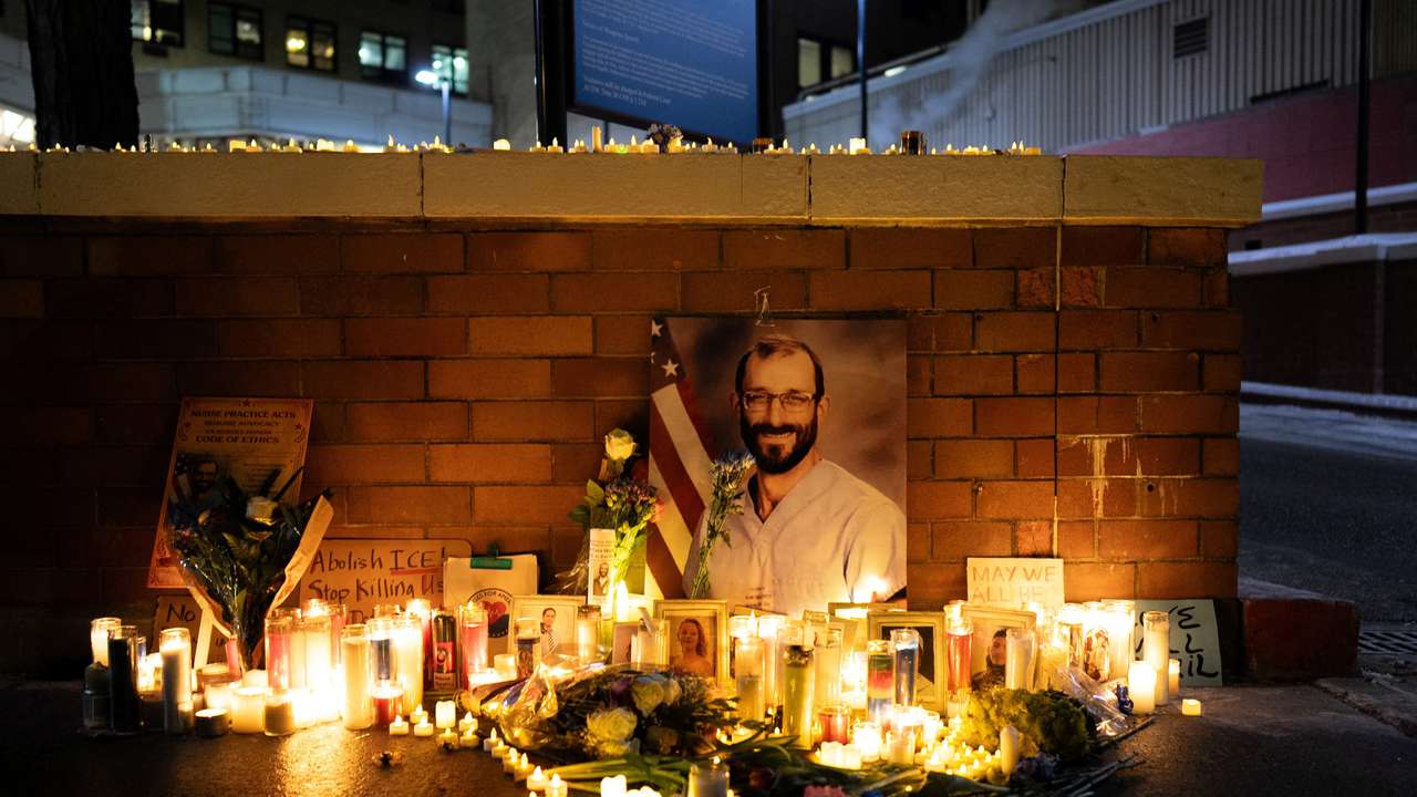 Federal workers and people gather during a vigil for Alex Pretti in New York