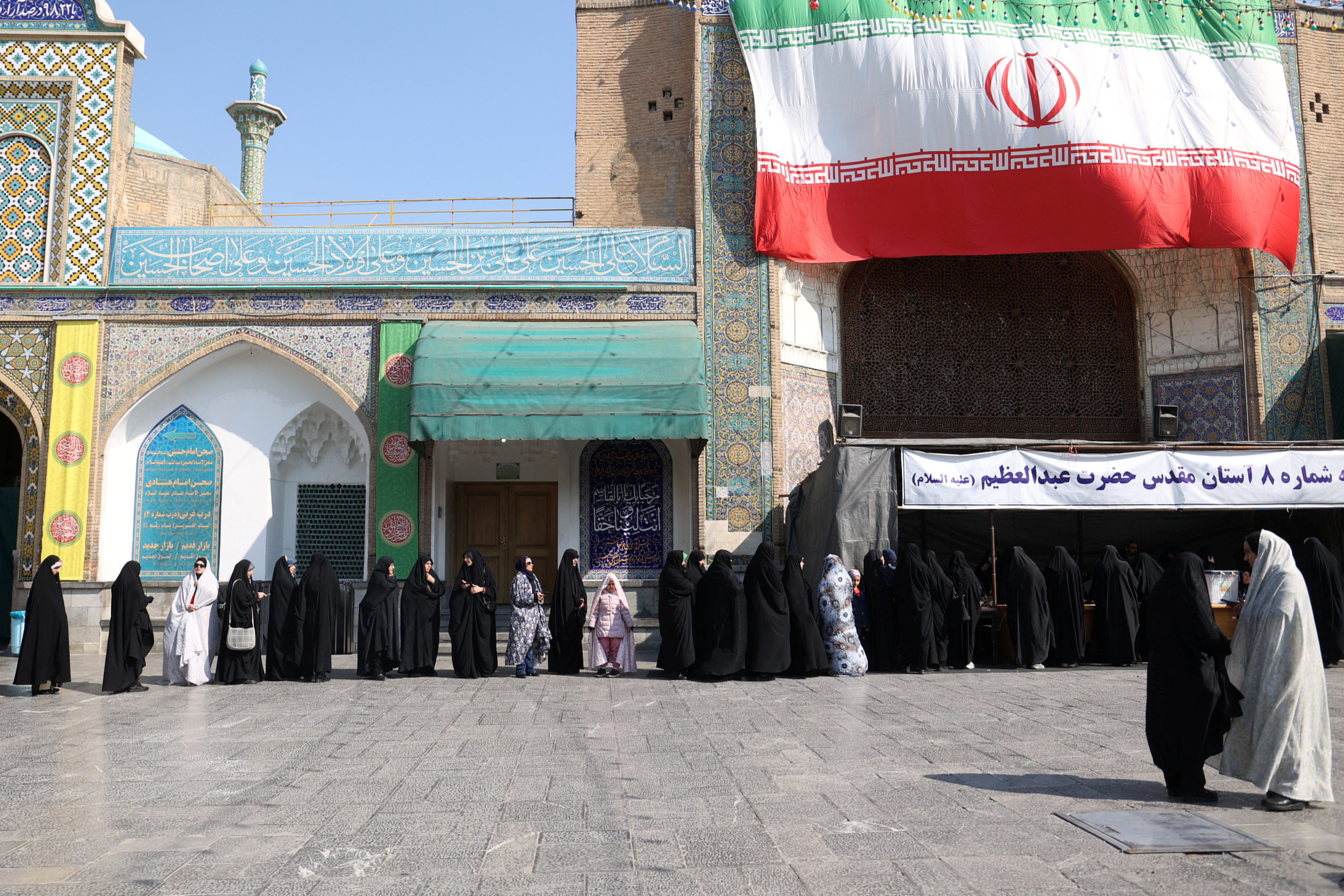 Iranians vote during parliamentary elections at a polling station in Tehran