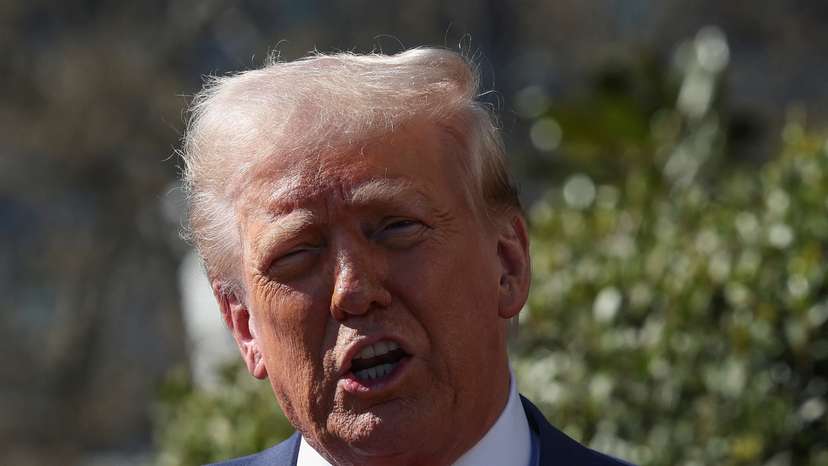 U.S. President Donald Trump views a Tesla car at the White House in Washington