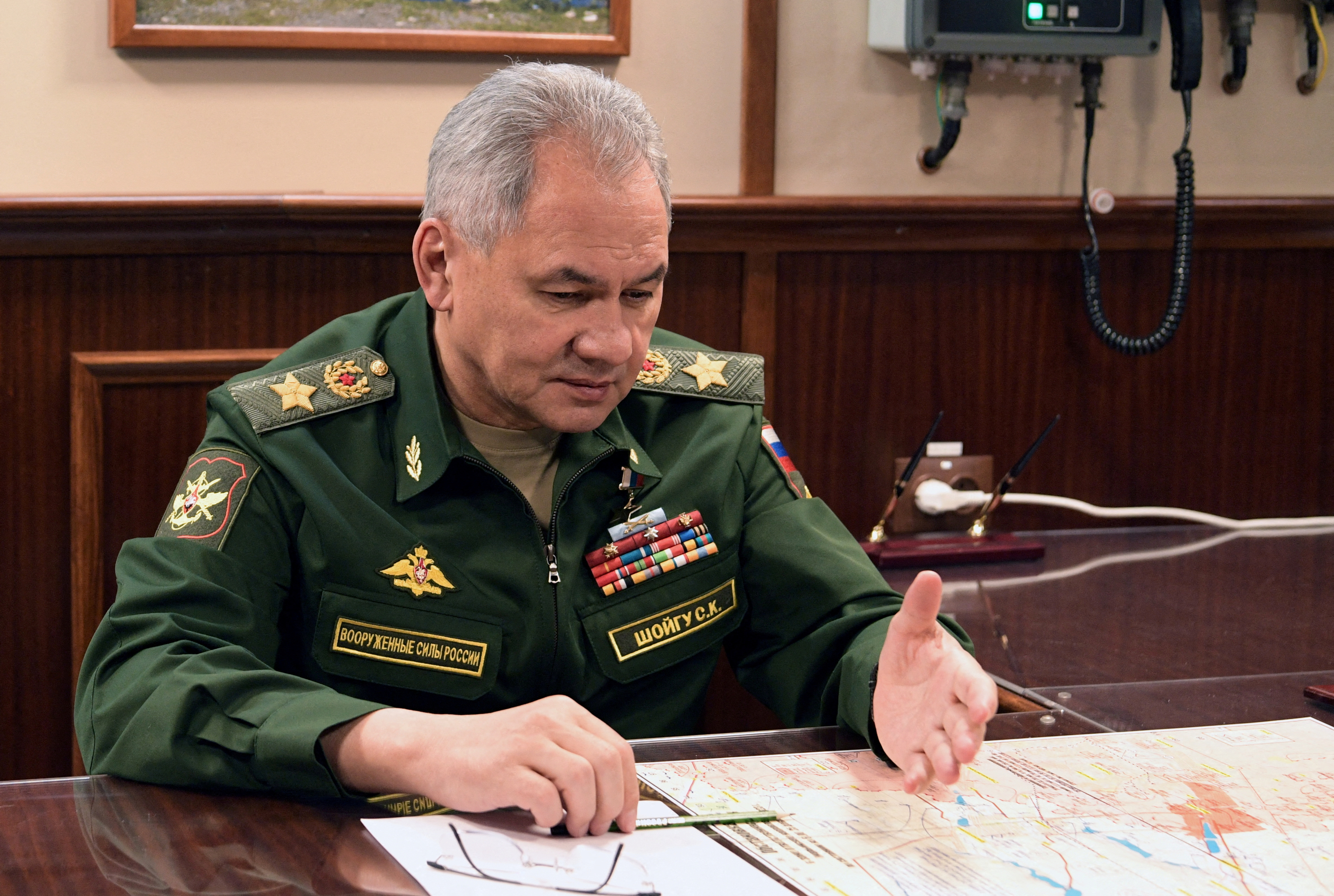 FILE PHOTO: Russia's President Putin and Defence Minister Shoigu meet in St Petersburg