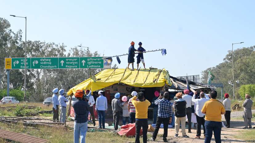 Farmers dismantle a shelter at a temporary camp where they had protested for more than a year to demand better crop prices, at the Shambhu barrier