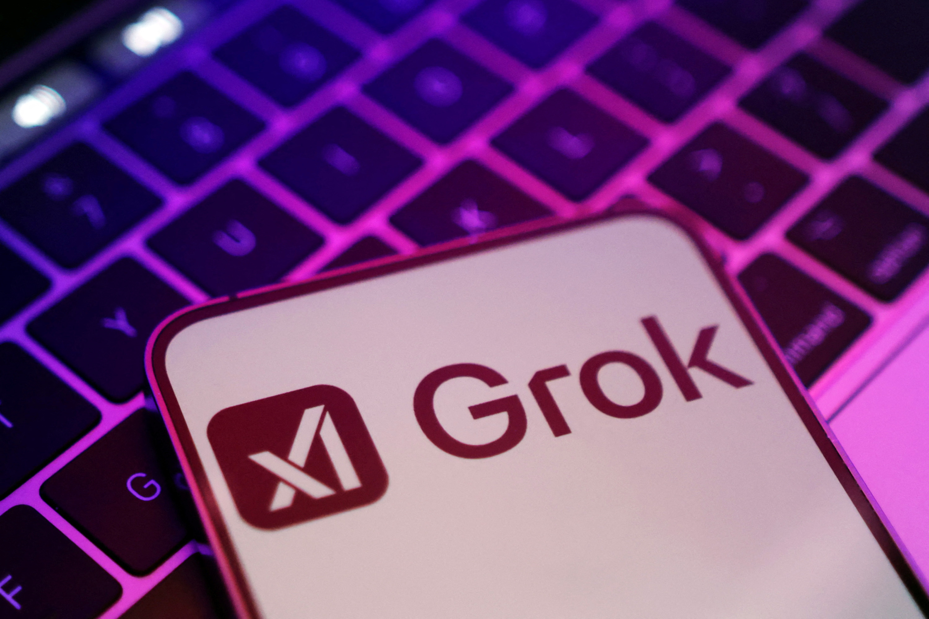 Illustration shows xAI and Grok logos