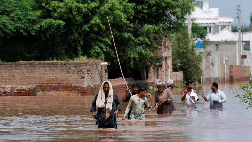 Monsoon rains and rising water levels in Qadirabad village near the Chenab River