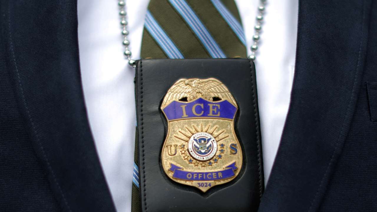 FILE PHOTO: An ICE officer is seen at Otay Mesa immigration detention center in San Diego