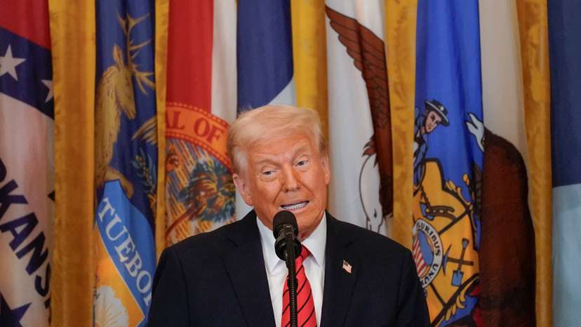 U.S. President Donald Trump signs an executive order to shut down the Department of Education