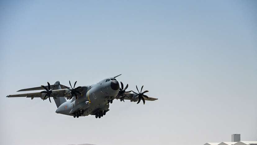 FILE PHOTO: A Belgian Air Force aircraft, loaded with humanitarian aid parcels, takes off for a mission to drop them over the Gaza Strip, in an undisclosed location