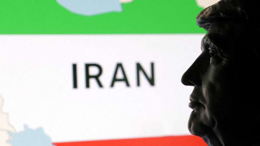 FILE PHOTO: Illustration shows 3D printed miniature of U.S. president Donald Trump and map of Iran