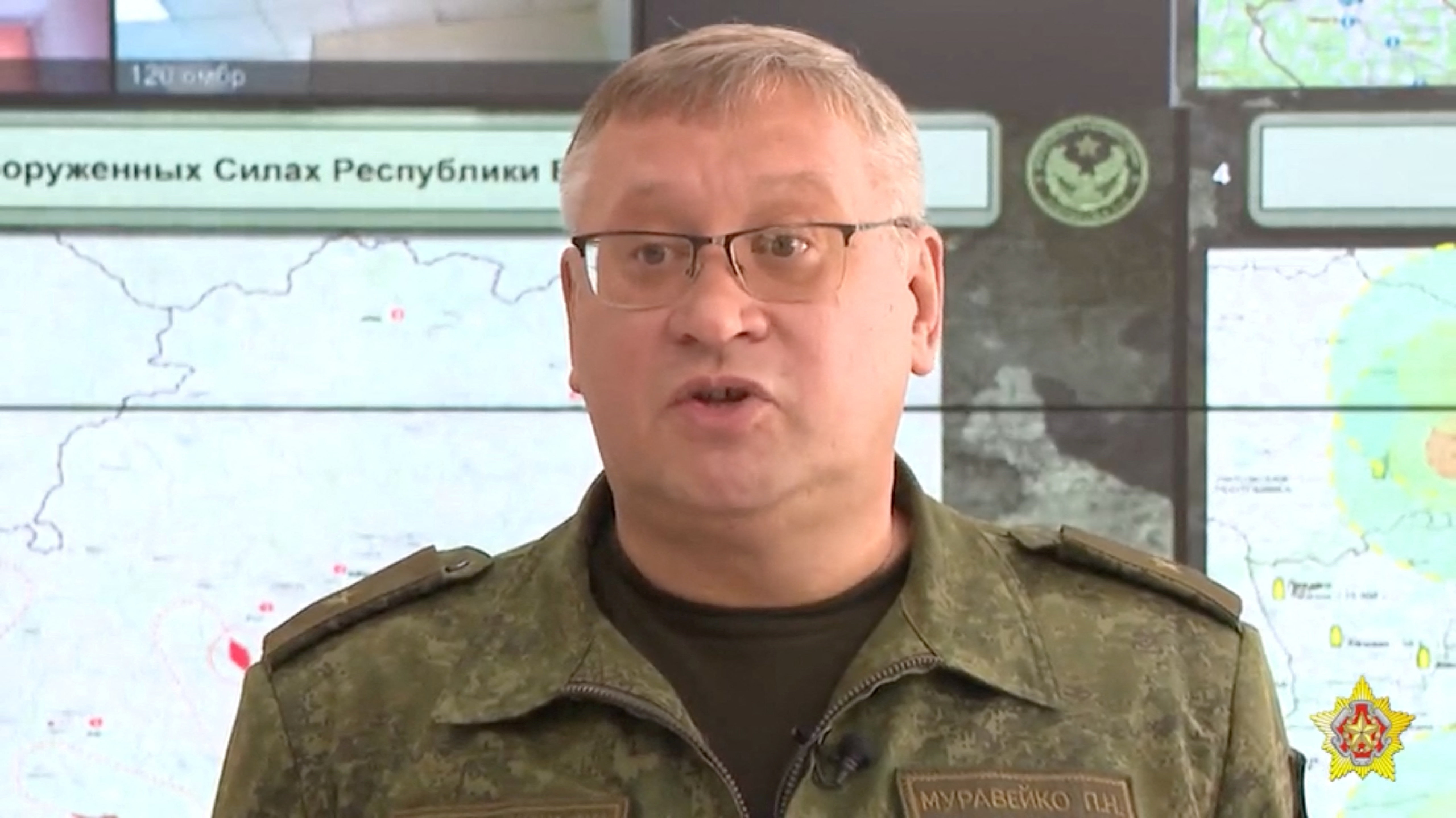 Chief of the General Staff of the Belarus Armed Forces Major General Pavel Muraveiko delivers a statement