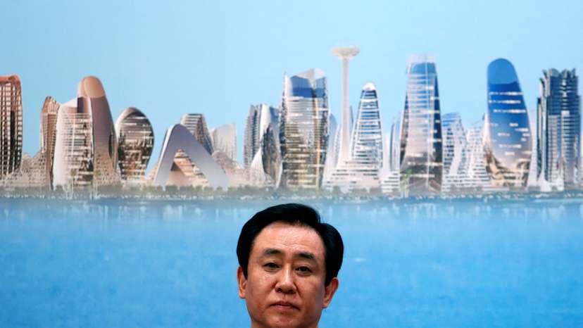 FILE PHOTO: China Evergrande Group Chairman Hui Ka Yan attends a news conference on the property developer's annual results in Hong Kong