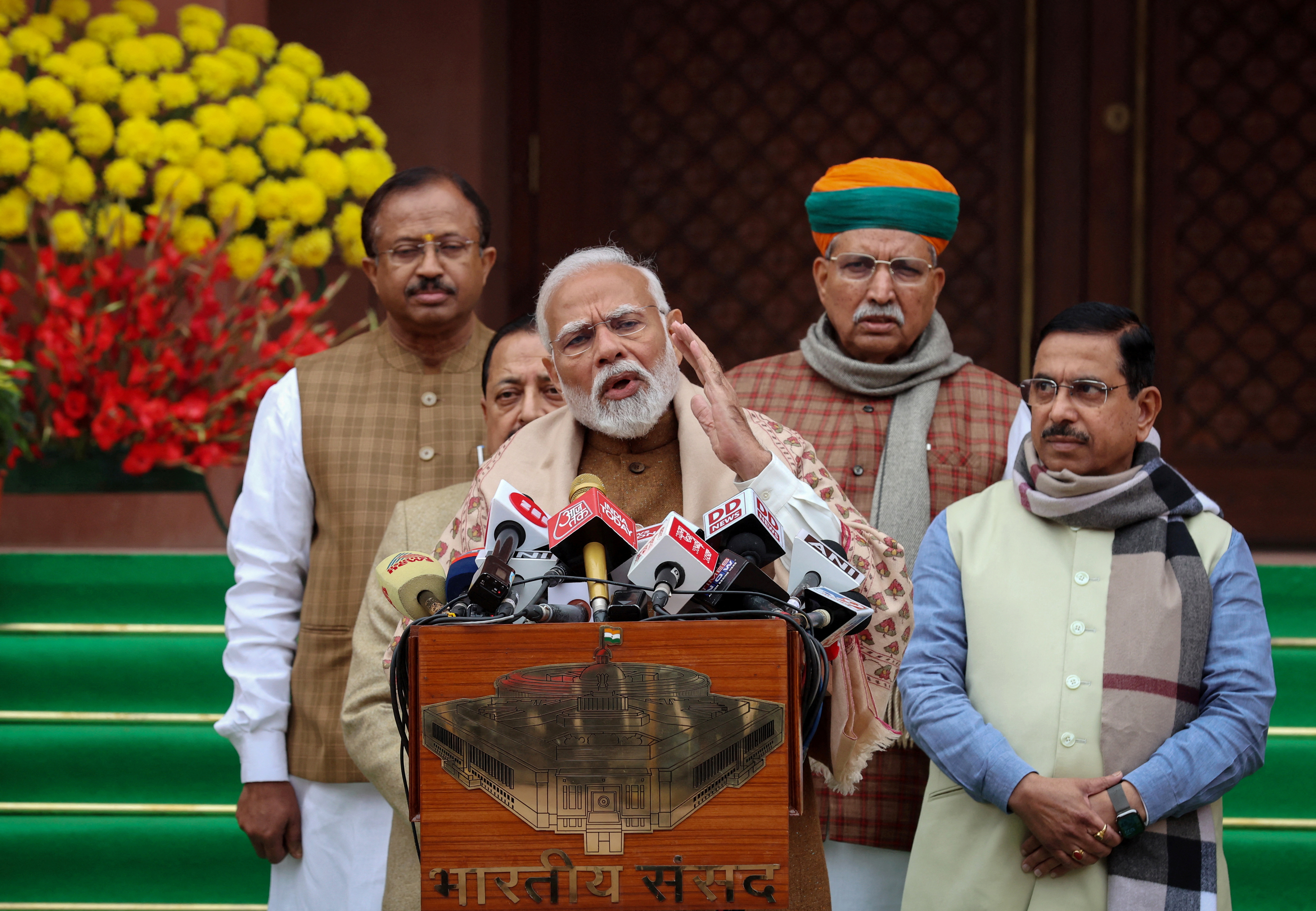 India's PM Modi speaks with the media inside the parliament premises, in New Delhi