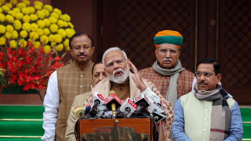 India's PM Modi speaks with the media inside the parliament premises, in New Delhi