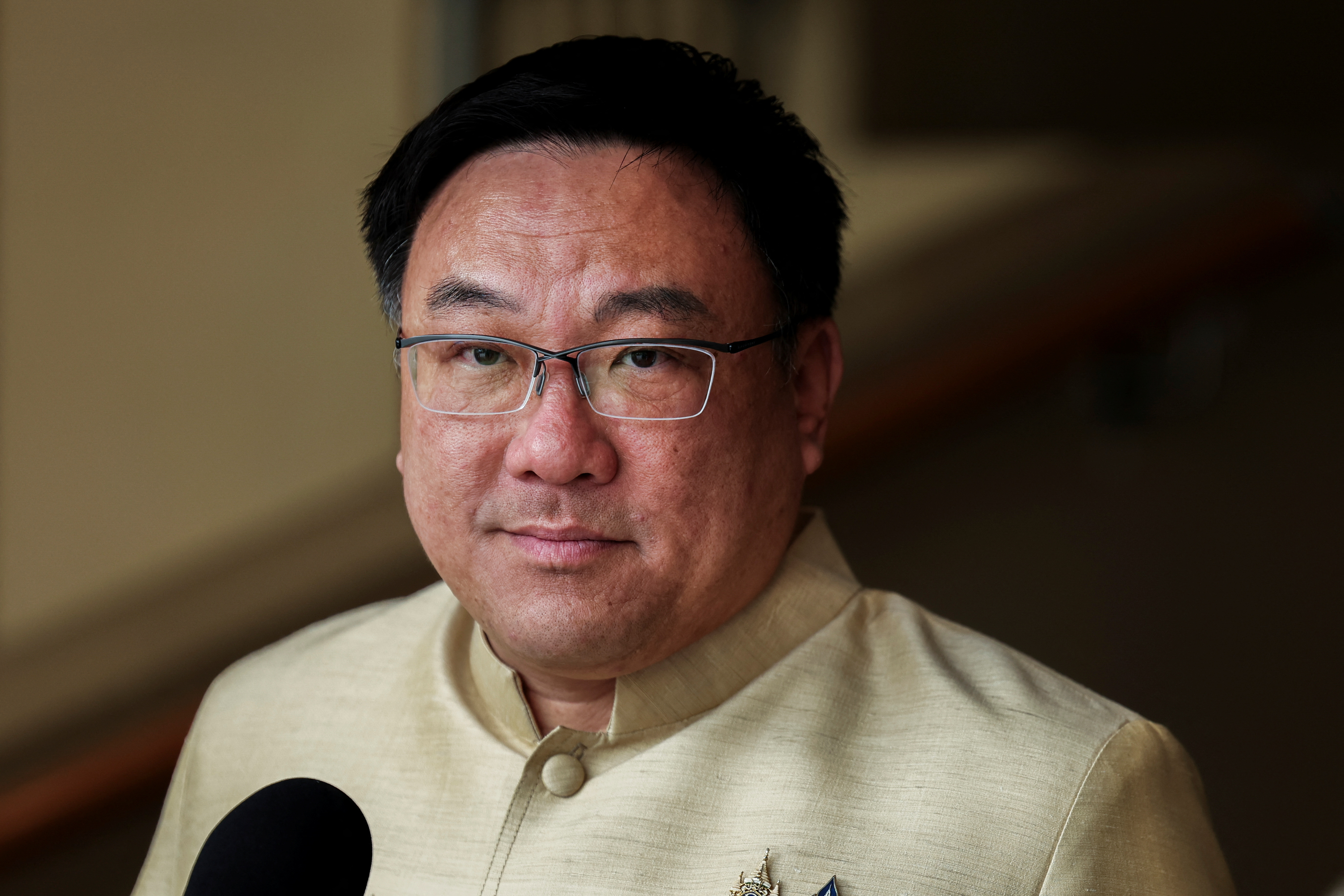 Thailand's Deputy Finance Minister Julapun Amornvivat looks on as he speaks to media after a cabinet meeting at the Government House, in Bangkok