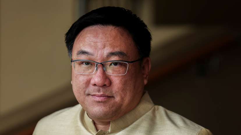 Thailand's Deputy Finance Minister Julapun Amornvivat looks on as he speaks to media after a cabinet meeting at the Government House, in Bangkok