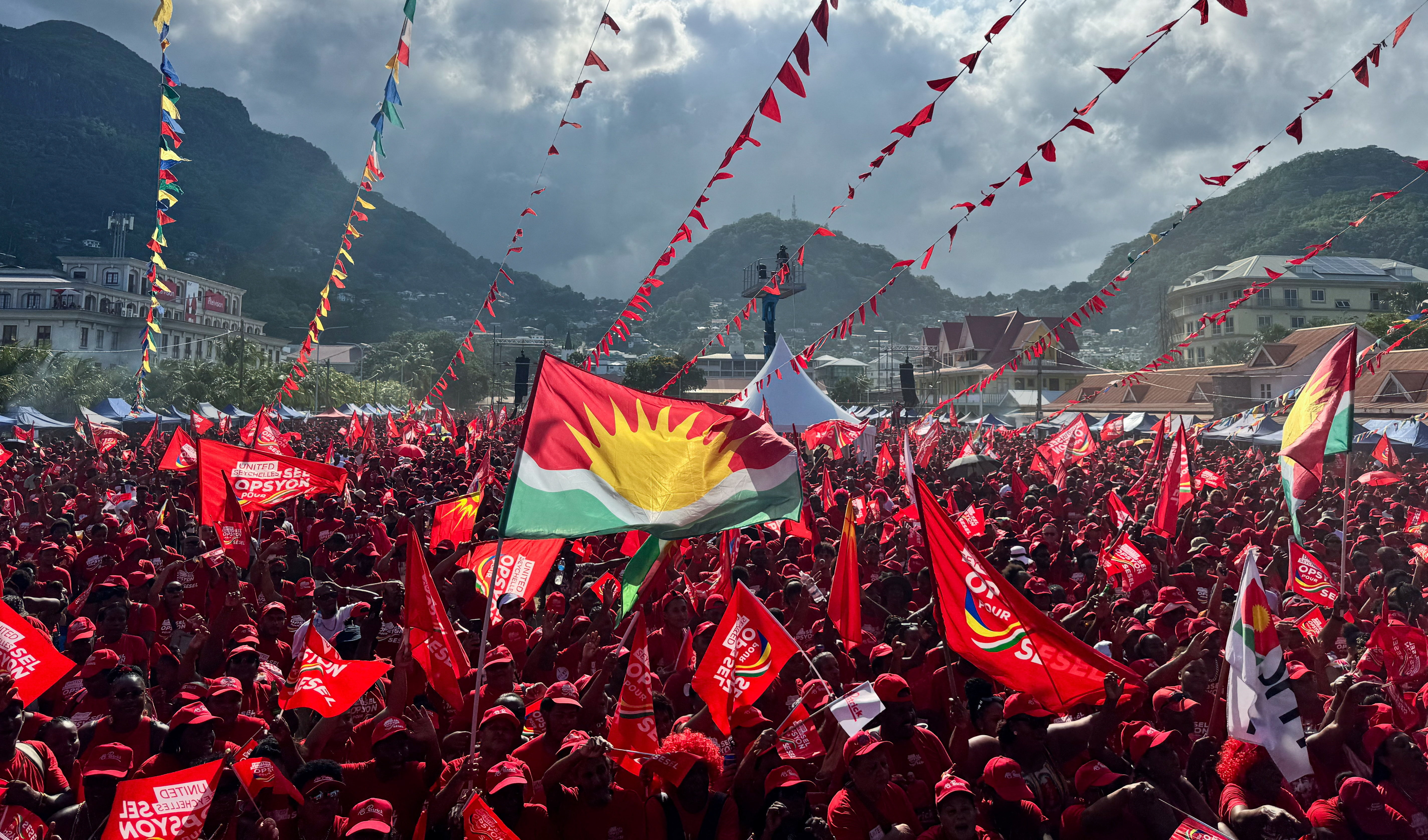 Supporters of Seychelles opposition leader of the United Seychelles (US) party and presidential candidate Patrick Herminie, attend his final rally ahead of the presidential runoff election in Victoria