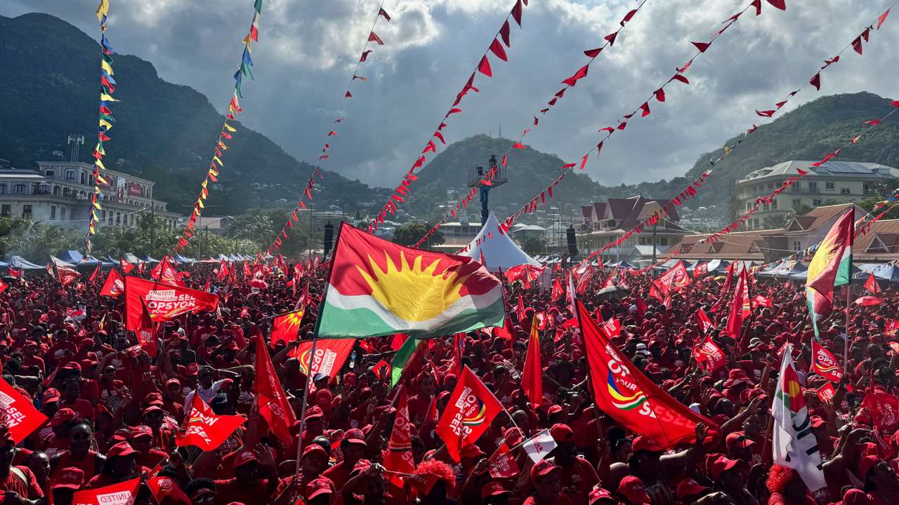 Supporters of Seychelles opposition leader of the United Seychelles (US) party and presidential candidate Patrick Herminie, attend his final rally ahead of the presidential runoff election in Victoria