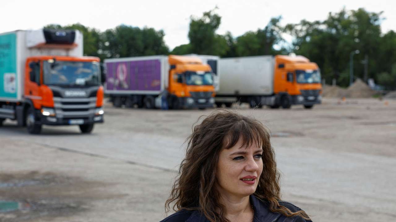 Truck driver Liliia Shulha speack during an interview with Reuters in Kyiv region