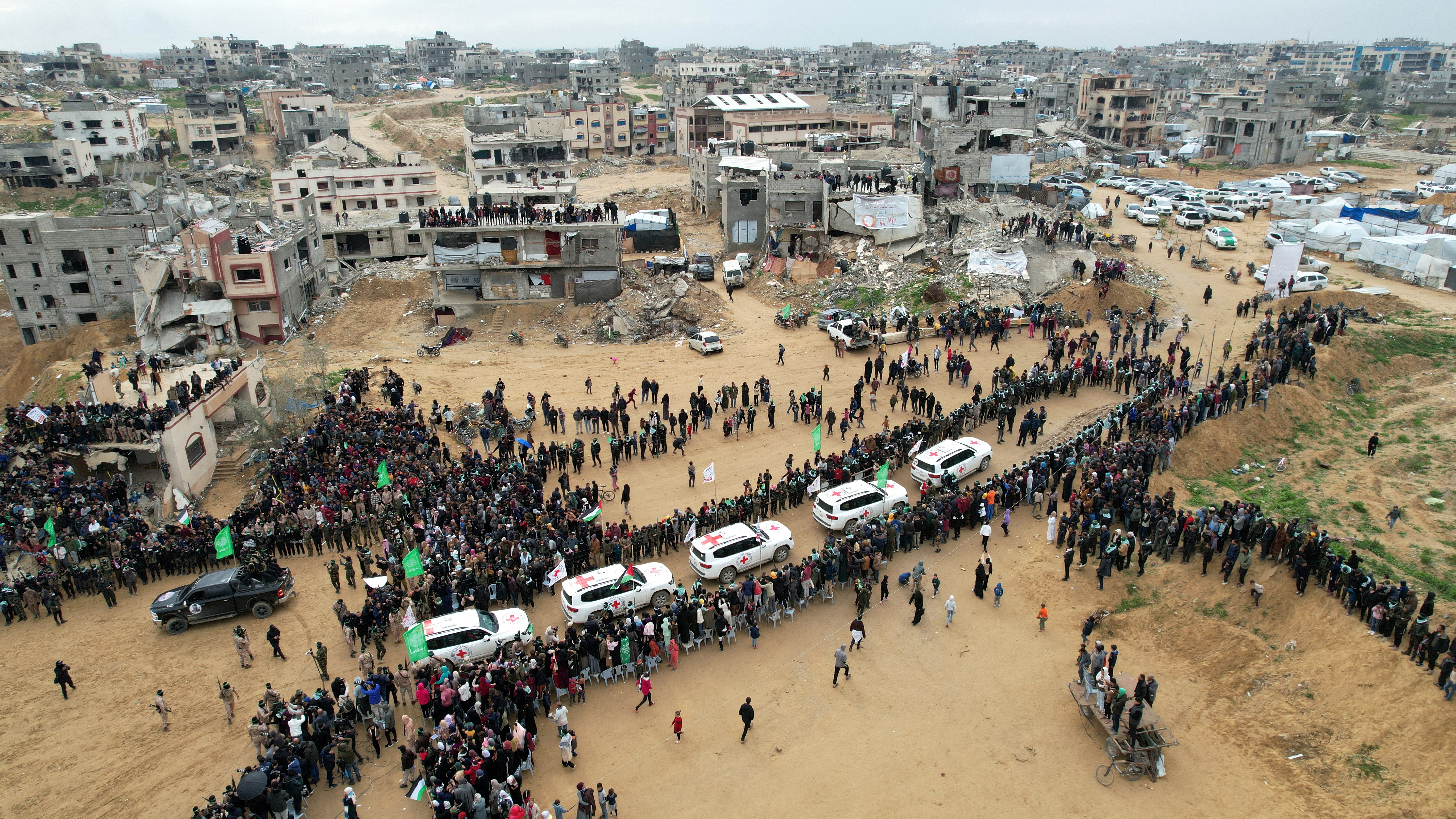 Hamas hands over bodies of deceased hostages, in Khan Younis