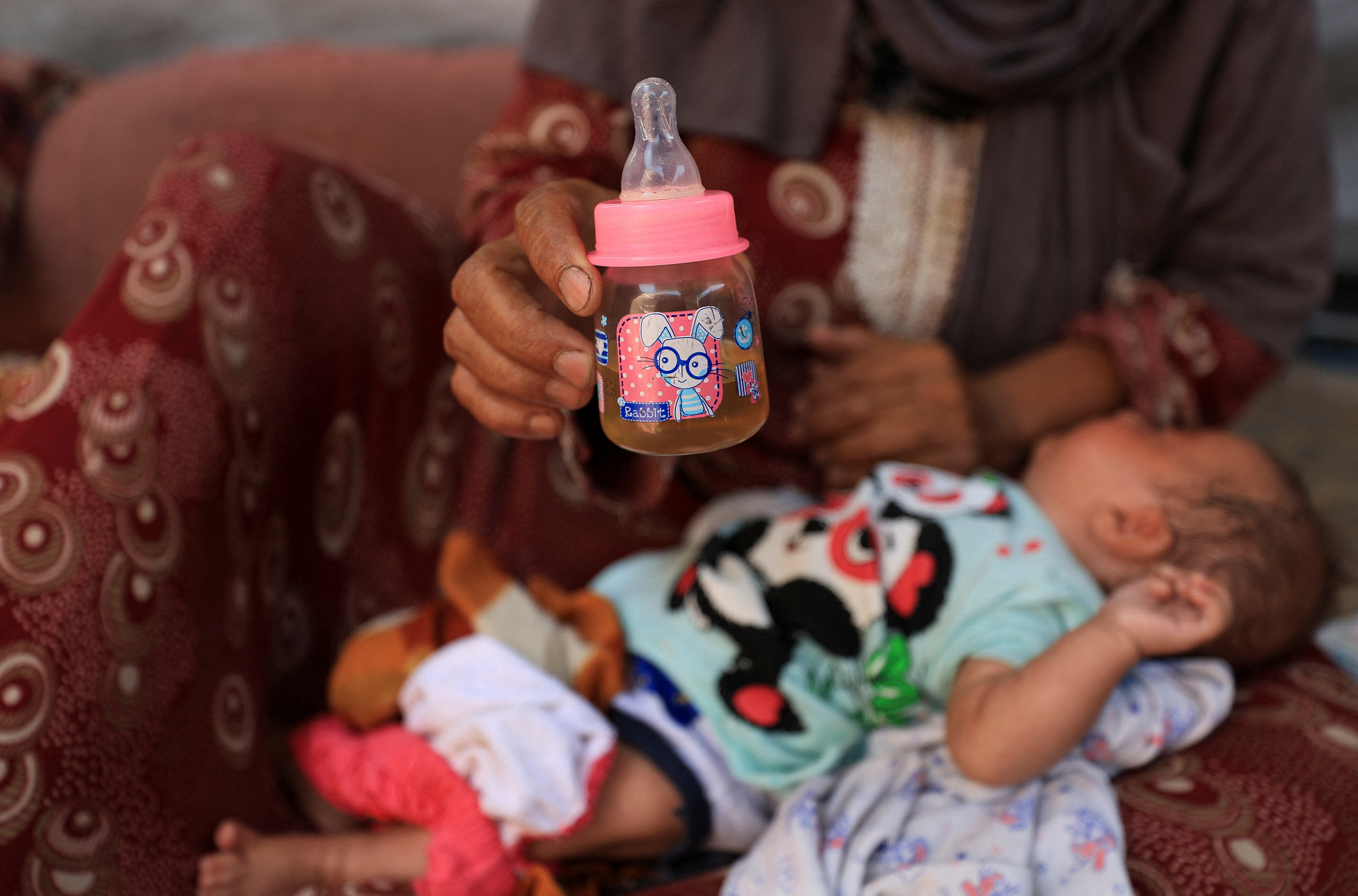 'If the baby could speak, she would scream': parents turn to risky measures to feed young infants in Gaza with infant formula, breastmilk not running out in Gaza City