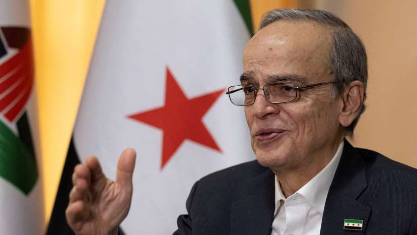 FILE PHOTO: Hadi Al Bahra, president of the National Coalition of Syrian Revolution and Opposition Forces, speaks during an interview with Reuters in Istanbul