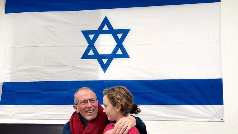 FILE PHOTO: Hostages released by Palestinian Islamist group Hamas meet family