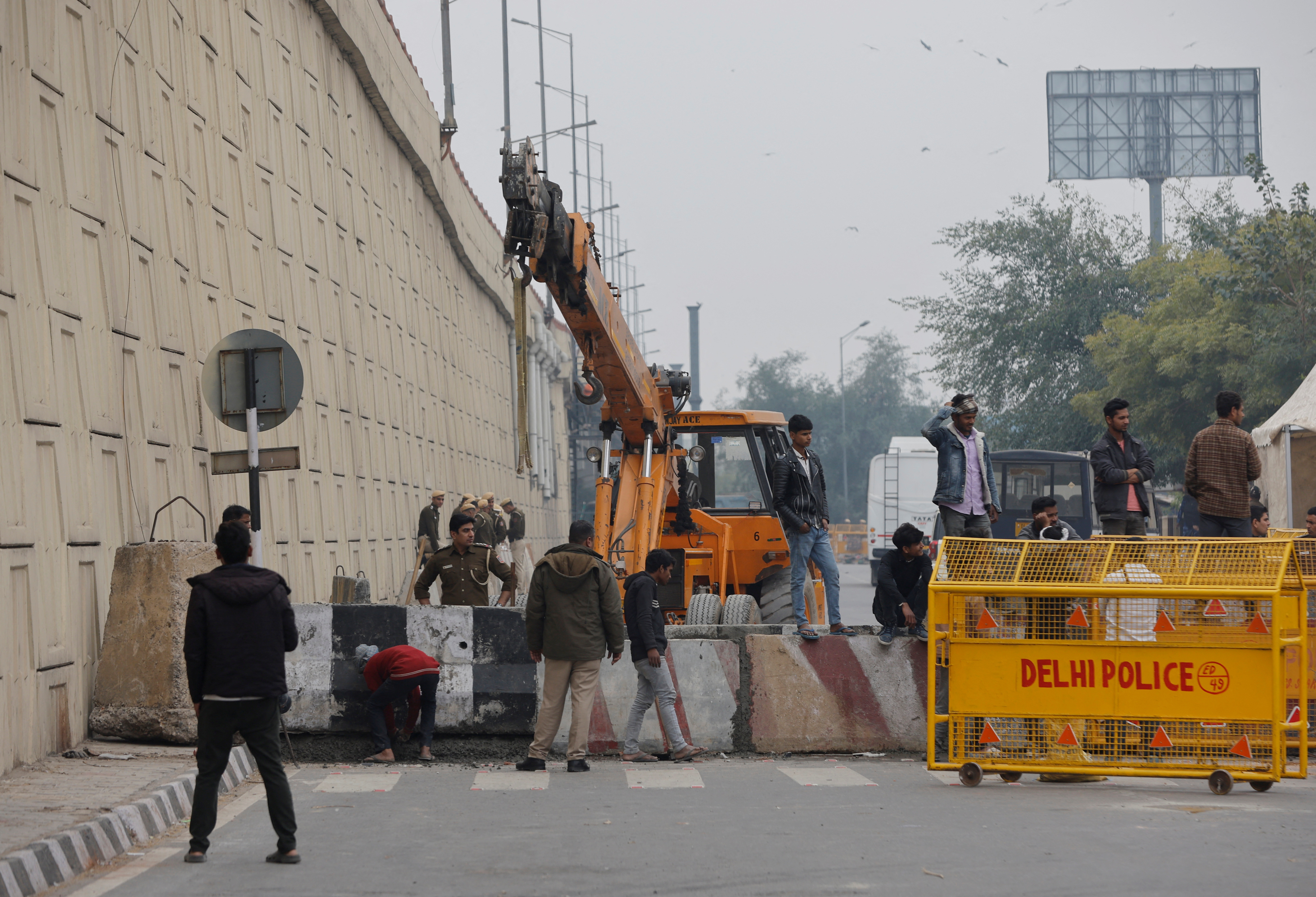 Police erect barricades on a highway to stop the farmers in Ghaziabad