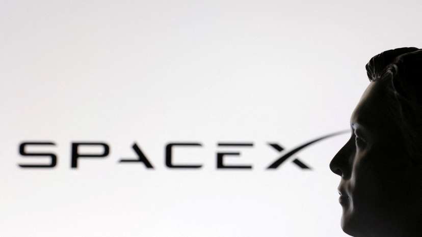 FILE PHOTO: Illustration shows 3D-printed miniature model of Elon Musk and SpaceX logo