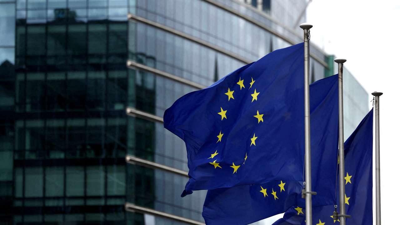 FILE PHOTO: European flags fly outside the European Commission headquarters in Brussels