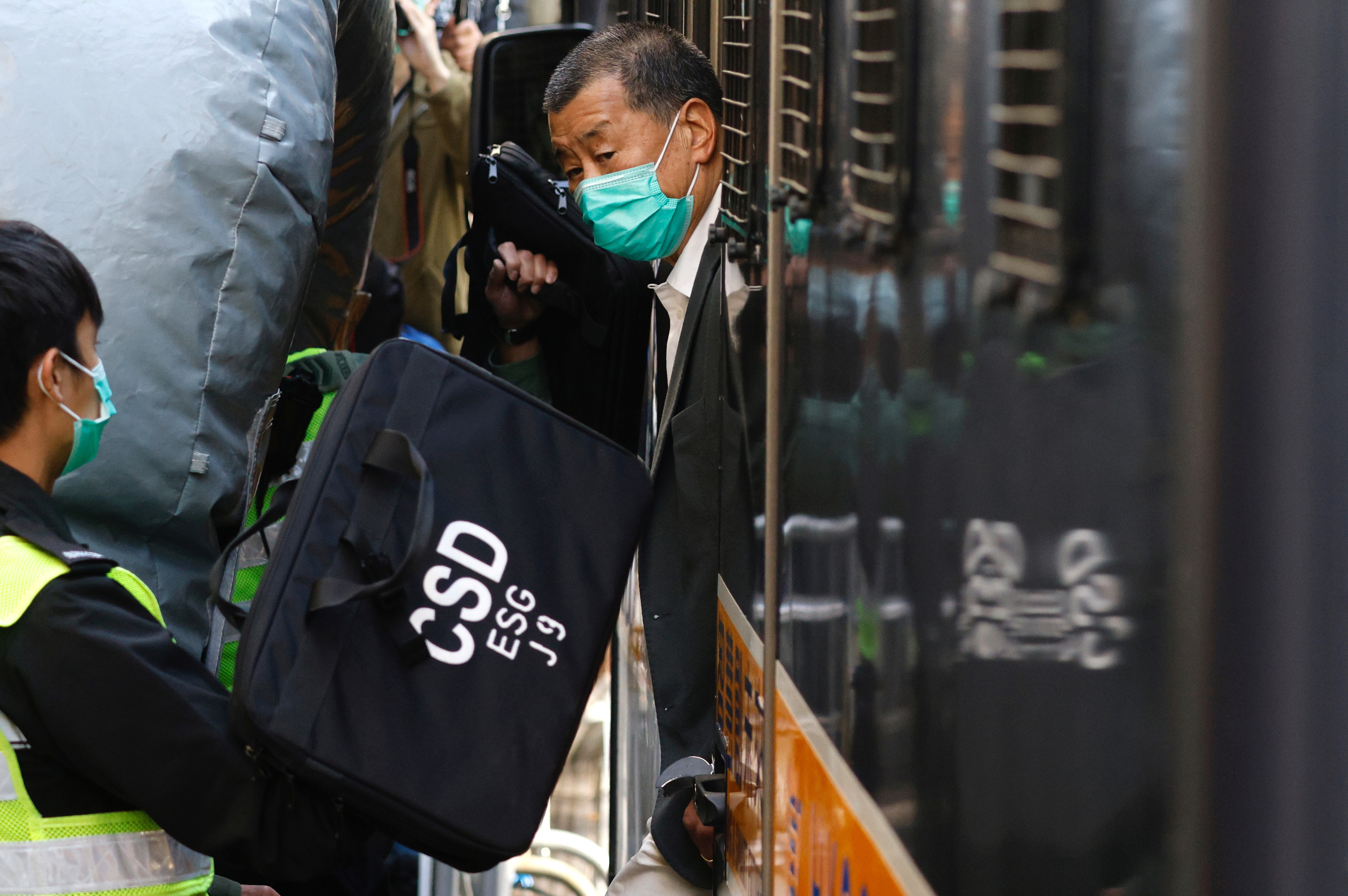 Media mogul Jimmy Lai, founder of Apple Daily, arrives the Court of Final Appeal by prison van in Hong Kong